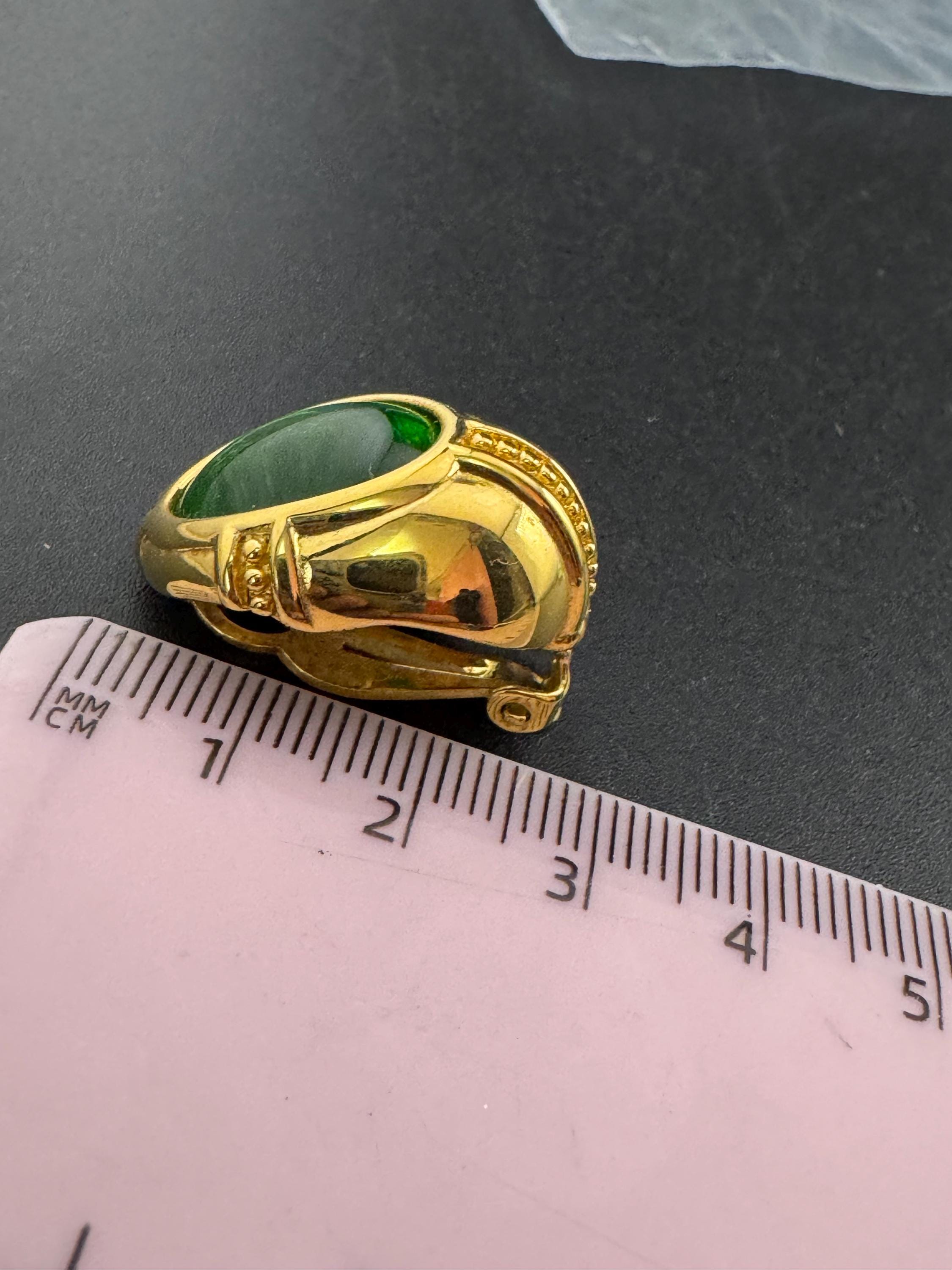 Signed Joan rivers bright green glass cabochon gold plated oval clip on earrings
