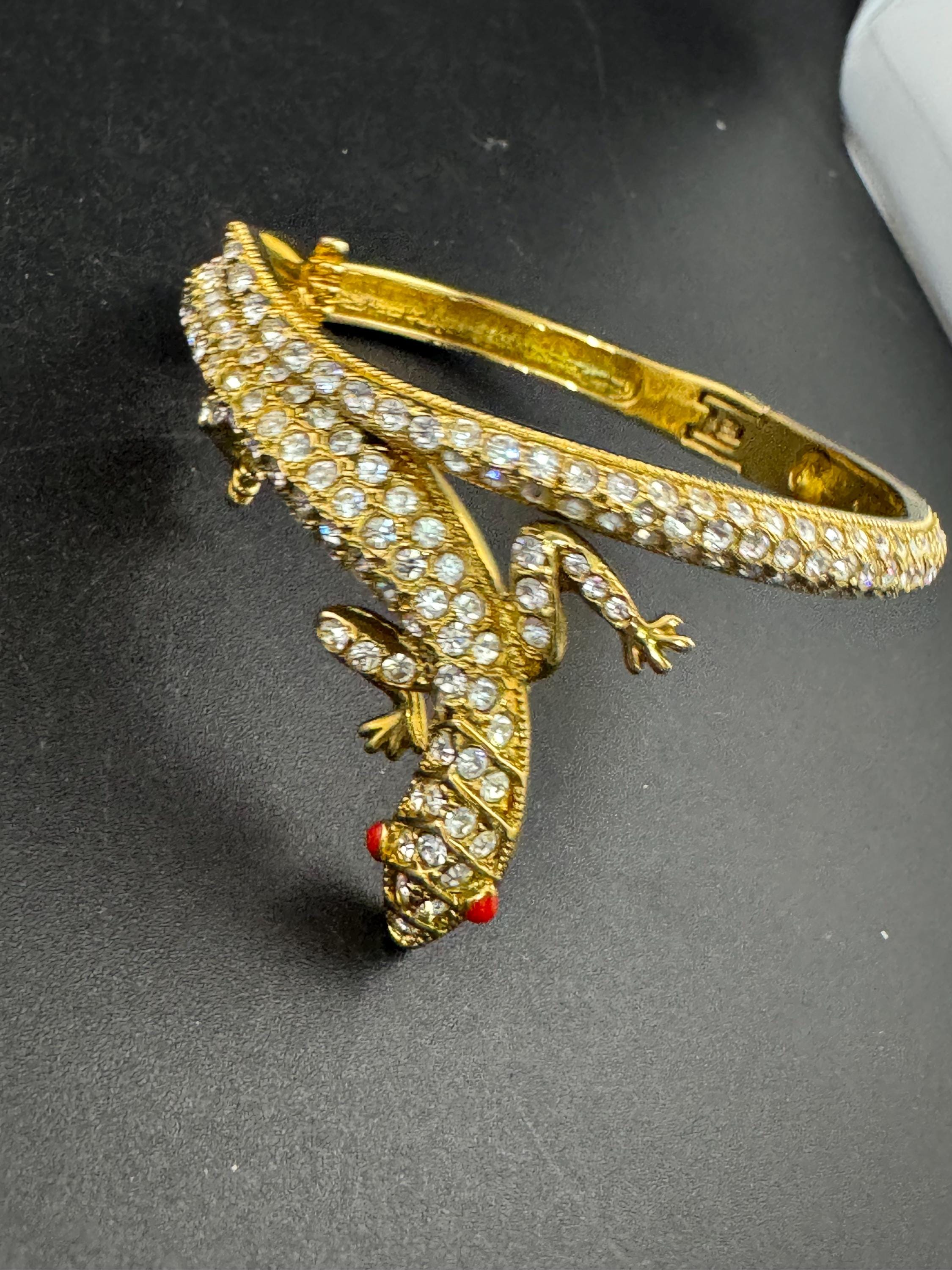Vintage clear rhinestone encrusted lizard clamper Bangle bracelet with red beaded eyes