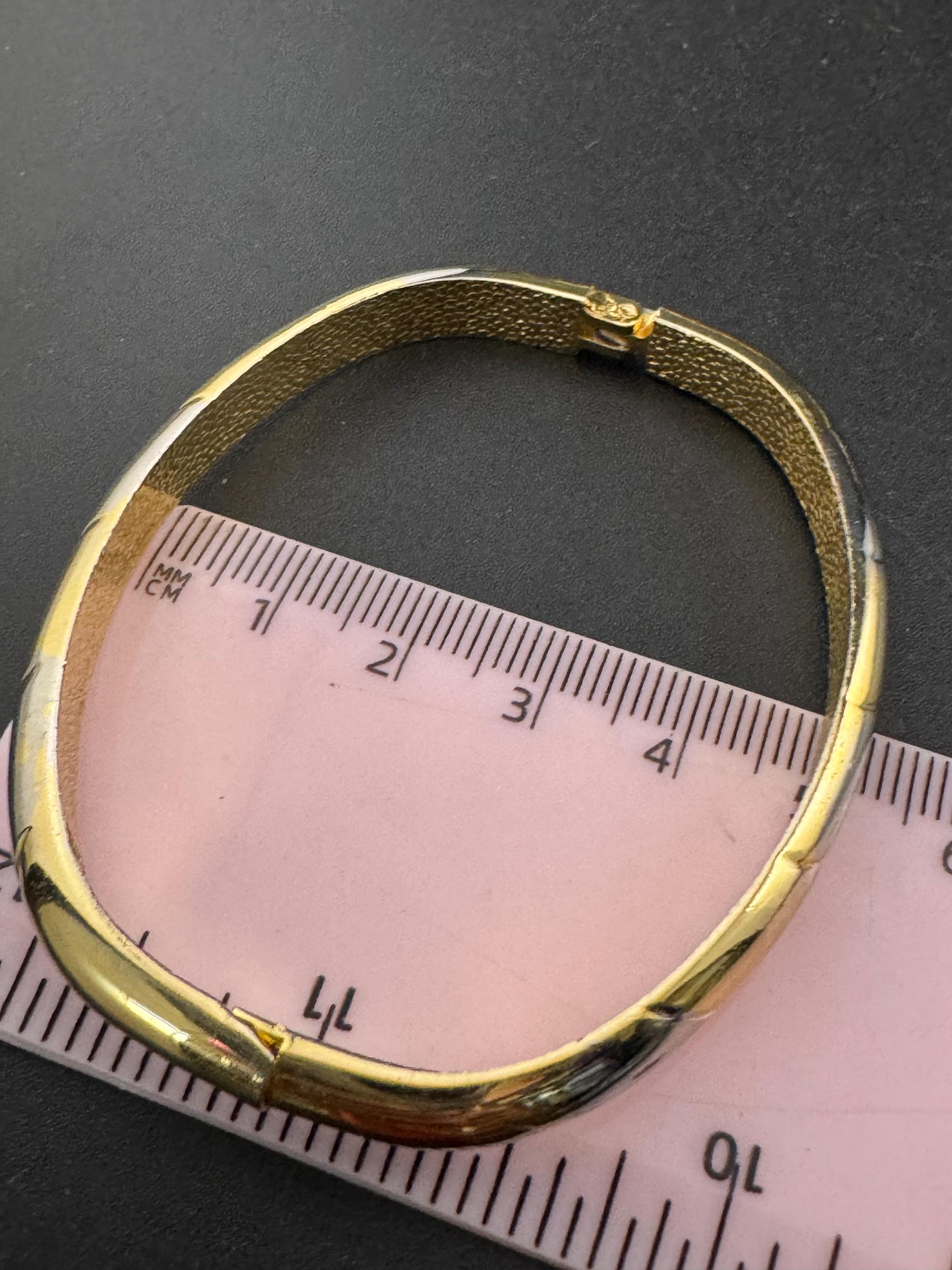 Vintage slim silver and gold tone striped hinged bangle bracelet