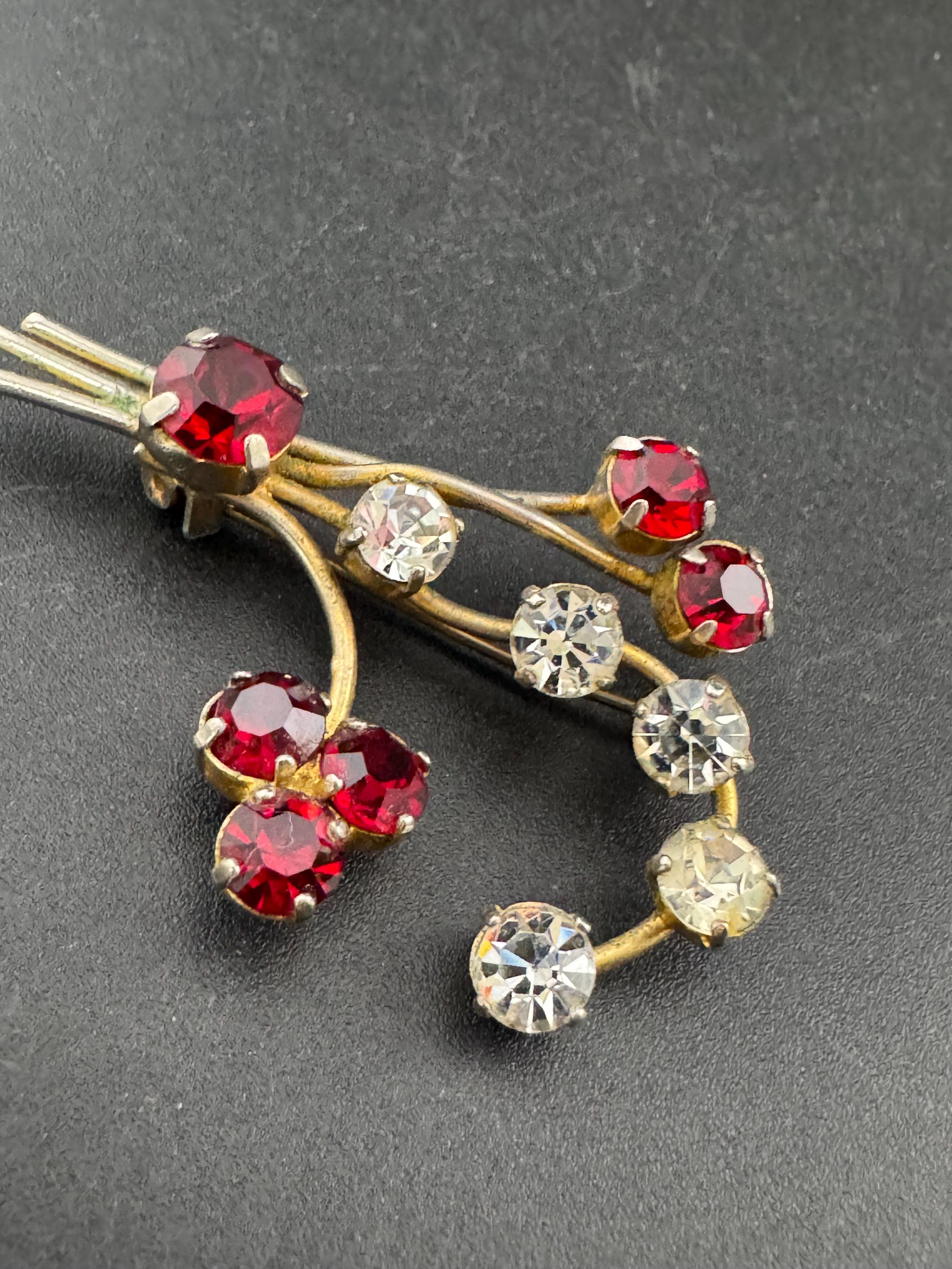 Vintage ruby red glass rhinestone gold tone floral brooch , mid century
