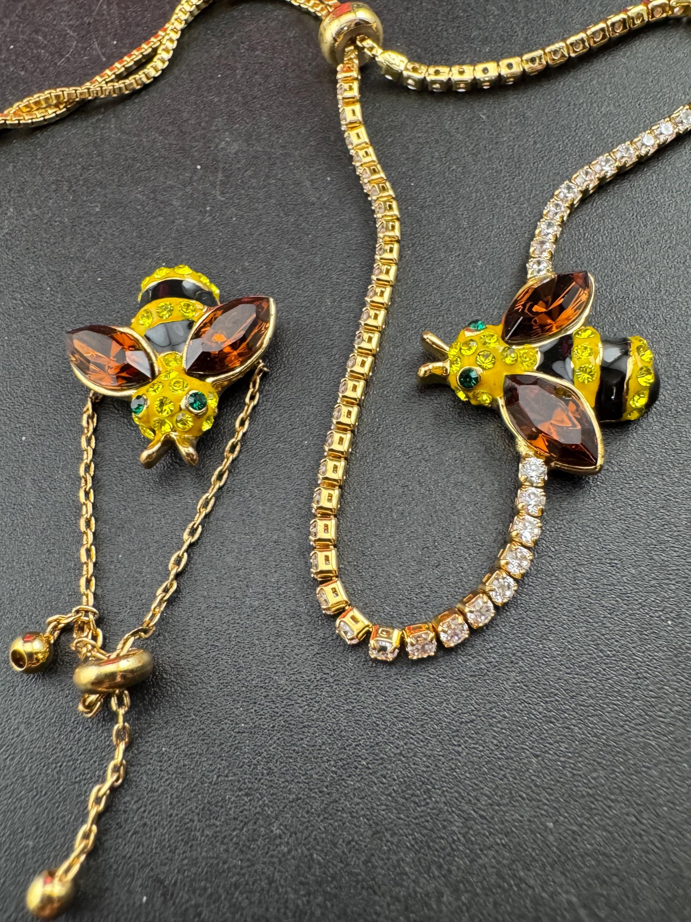 Signed butler and Wilson gold tone bumble bee jewellery set , tennis bracelet and adjustable dress ring , boxed,