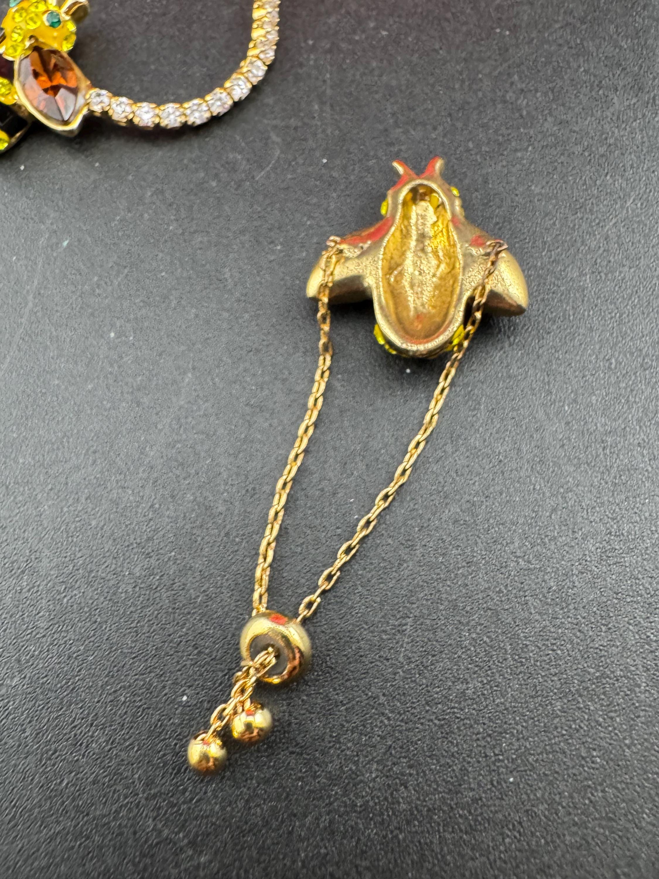 Signed butler and Wilson gold tone bumble bee jewellery set , tennis bracelet and adjustable dress ring , boxed,