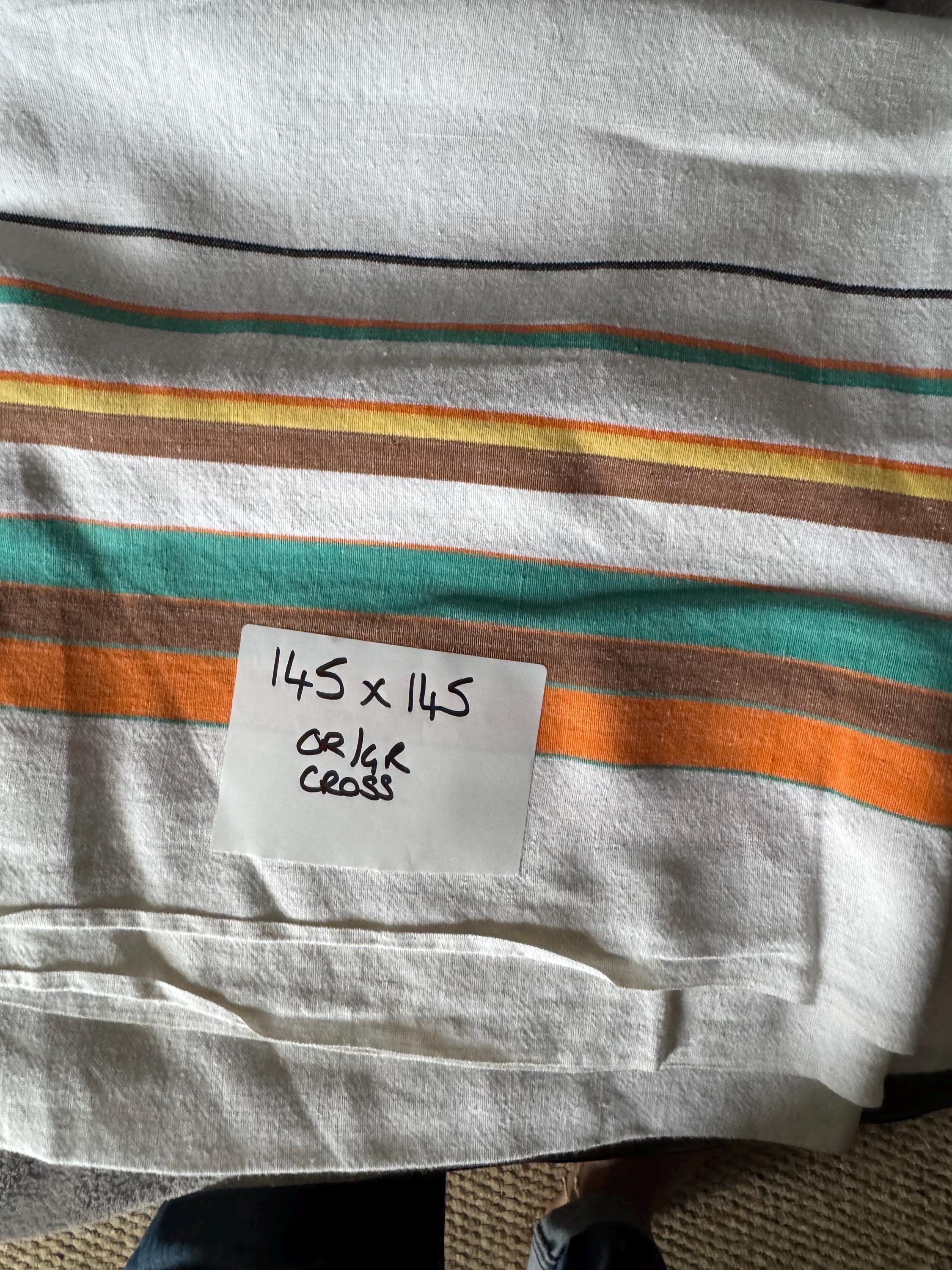Large 145cm near square off white with orange brown green and yellow geometric stripes and check large printed tablecloth