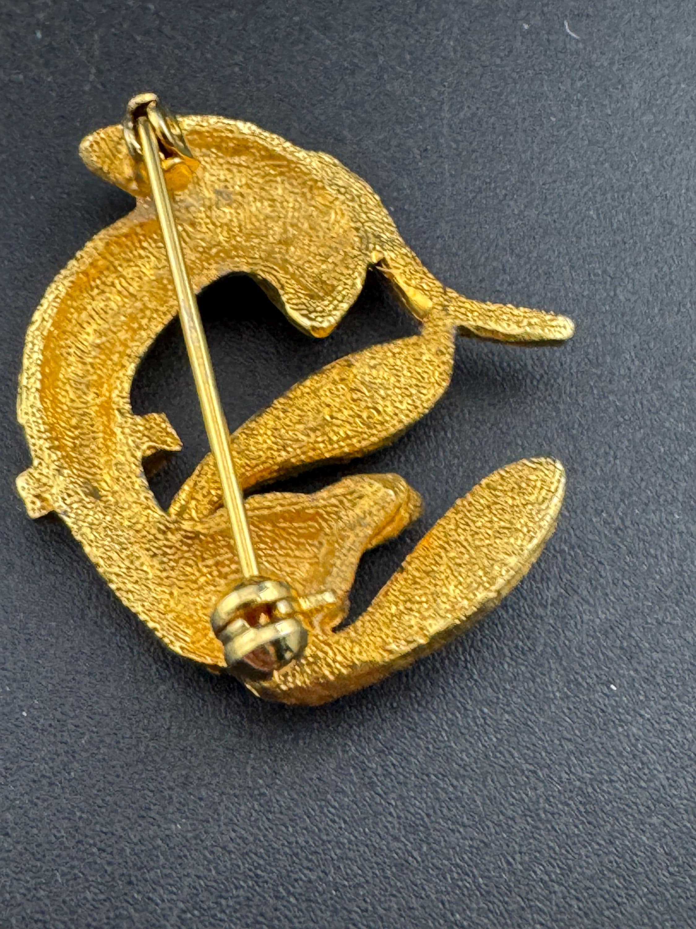 Mid century Dachshund sausage dog rhinestone brooch, Gold tone