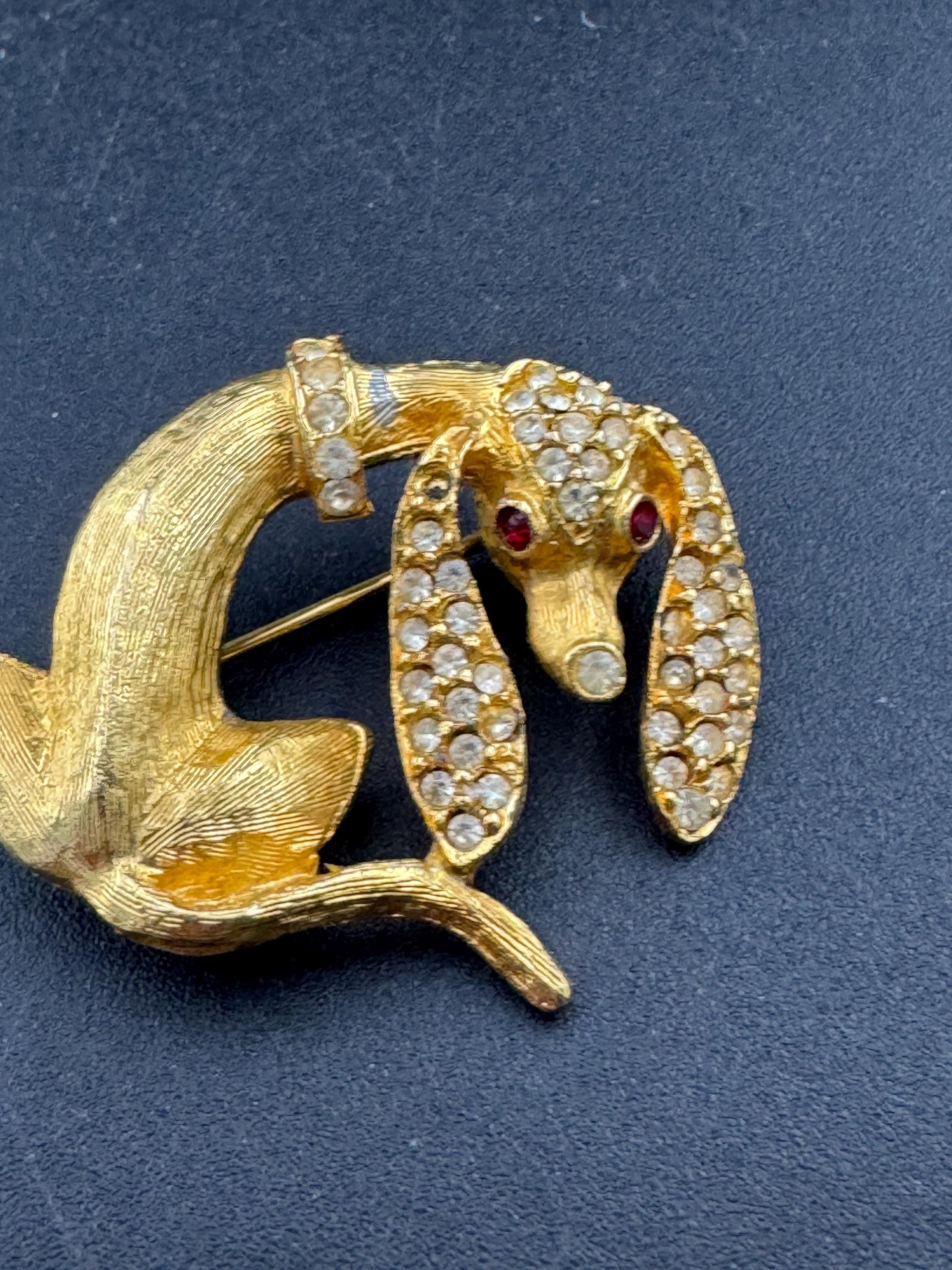 Mid century Dachshund sausage dog rhinestone brooch, Gold tone