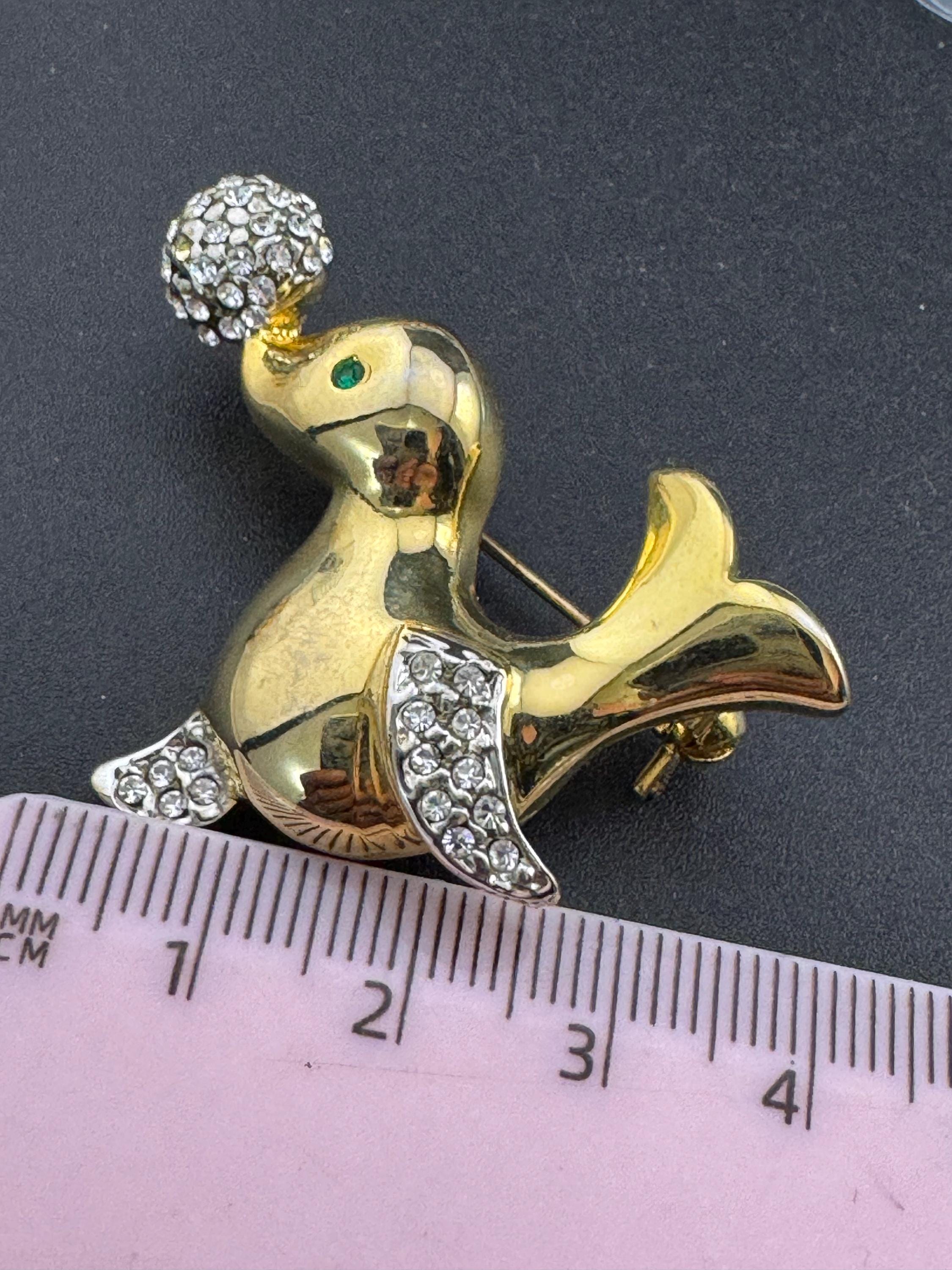 Vintage gold plated seal brooch, crystal rhinestones