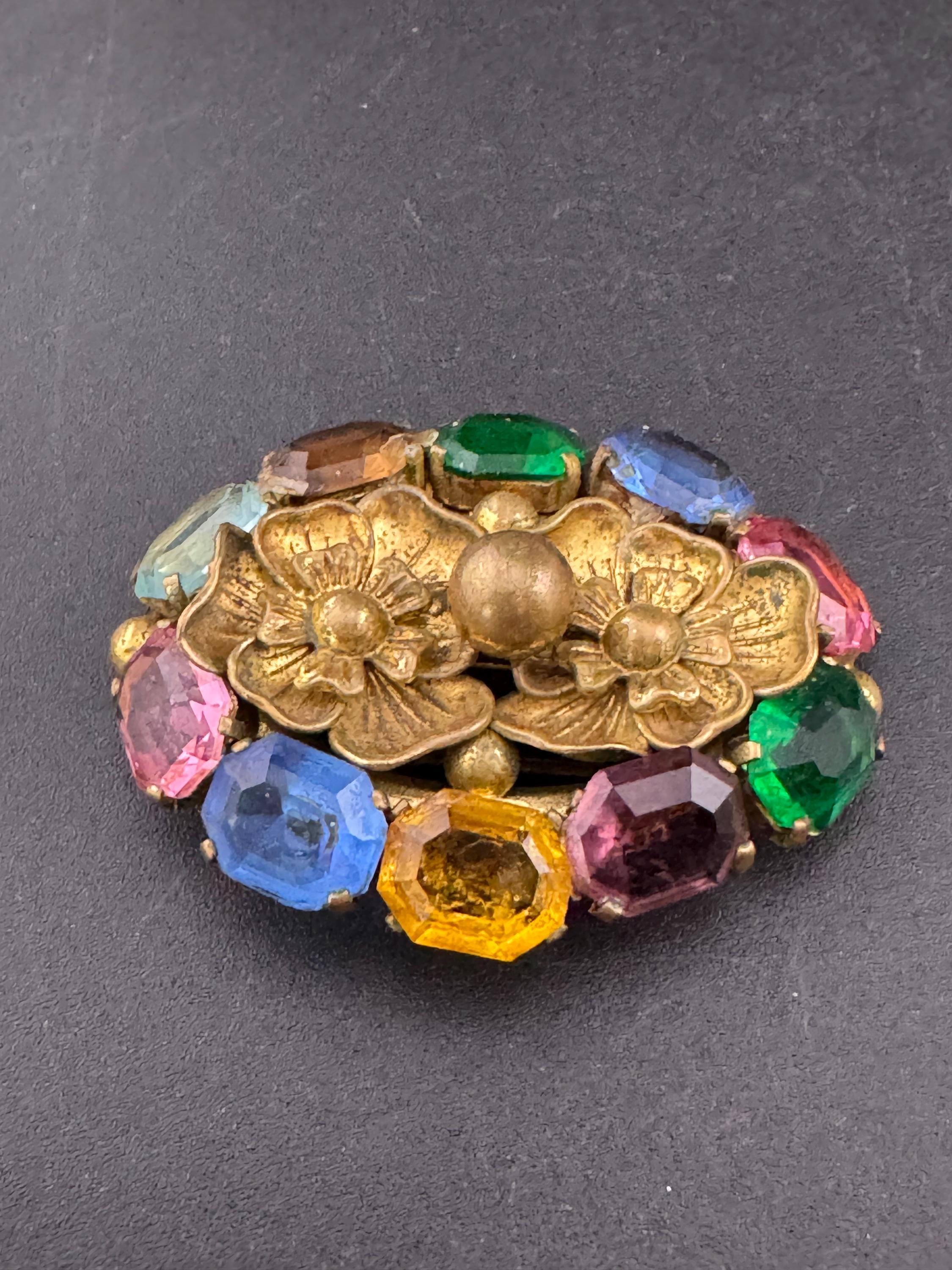 Antique Edwardian gold tone rainbow diamanté crystal oval open back brooch