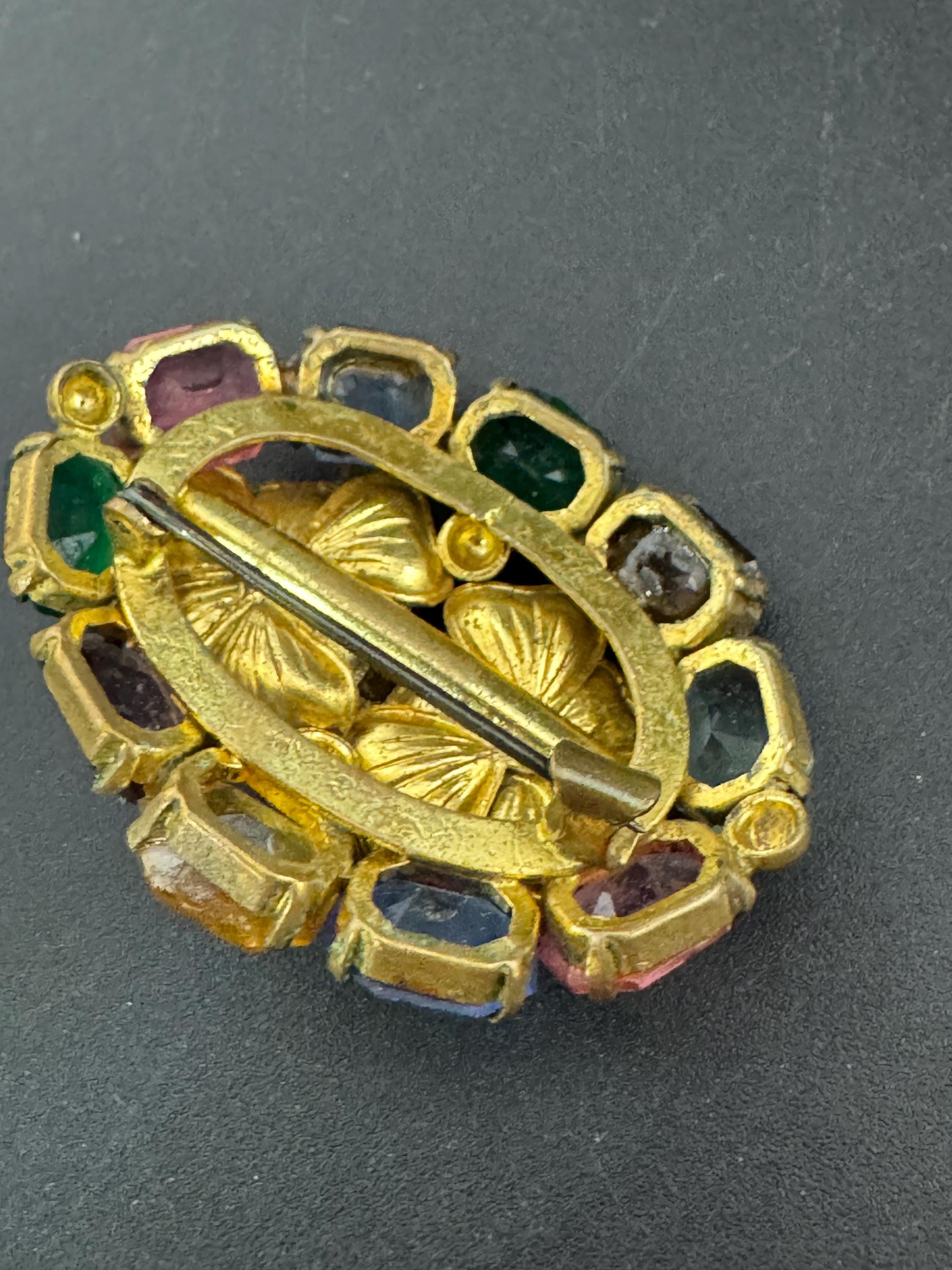 Antique Edwardian gold tone rainbow diamanté crystal oval open back brooch