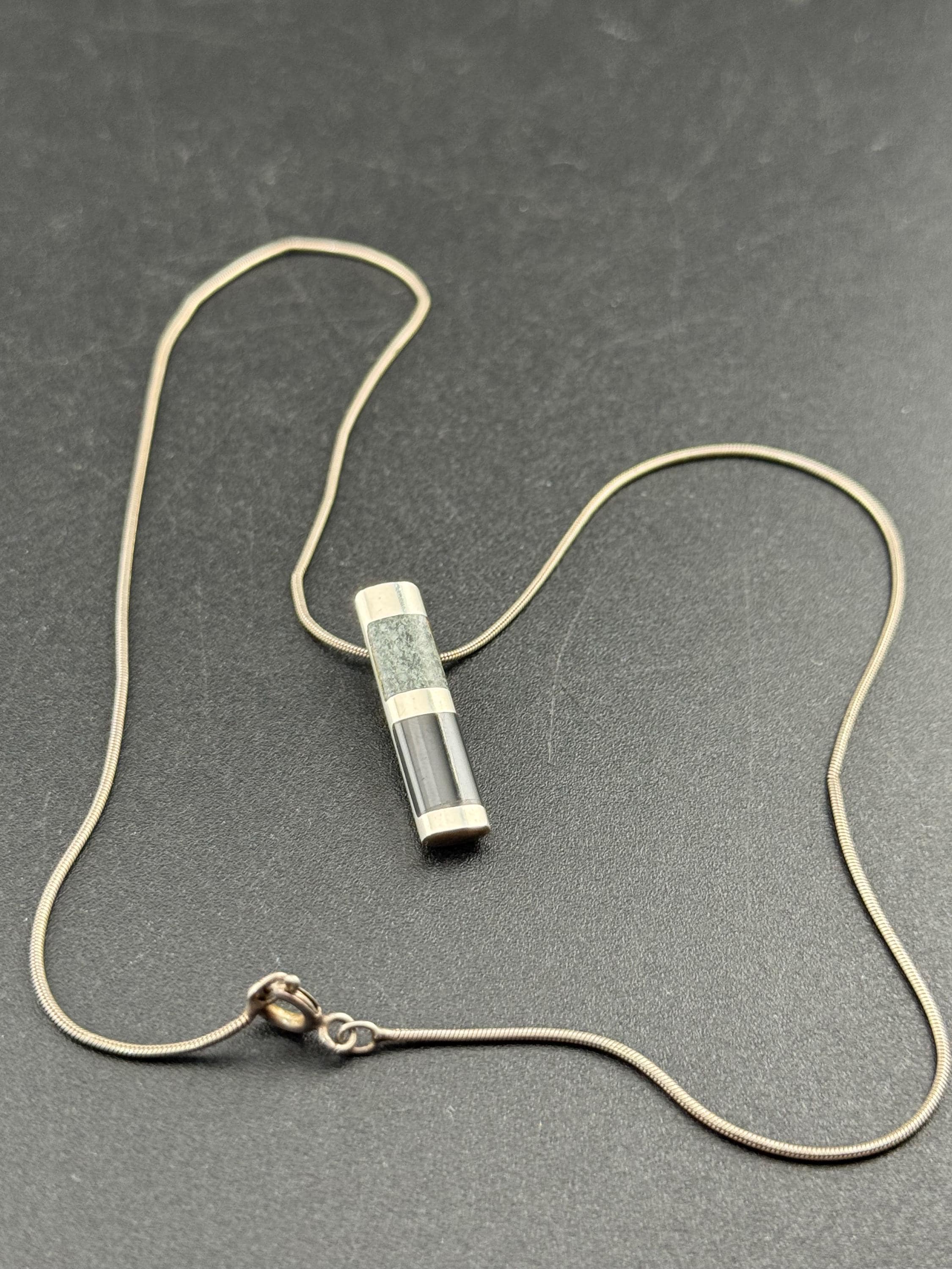 Modernist black and green grey gemstone stamped 925 silver sleek pendant necklace on a 40cm chain, maker scs full assay marks