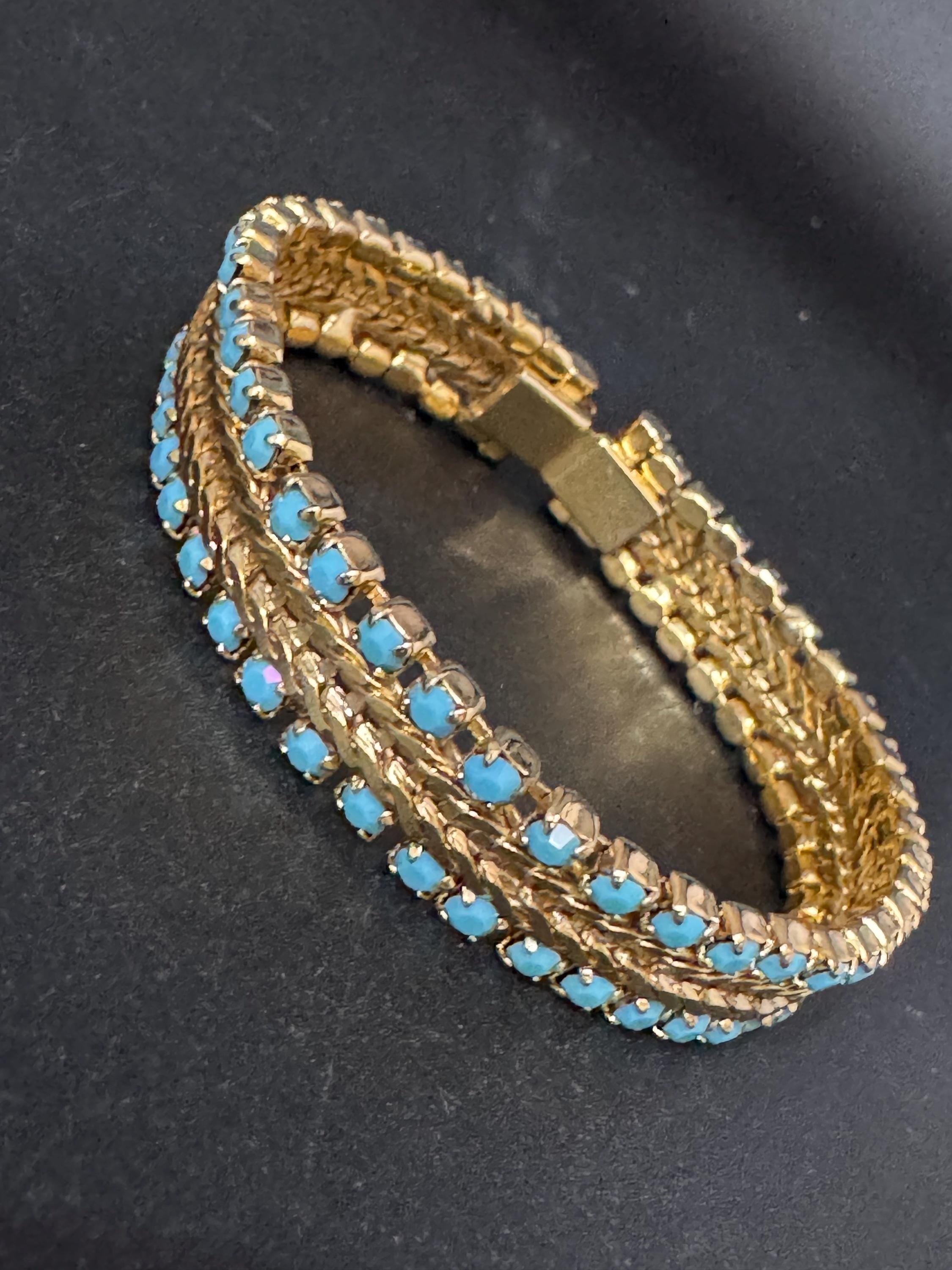 Vintage articulated flat link mesh gold tone bracelet with turquoise blue paste