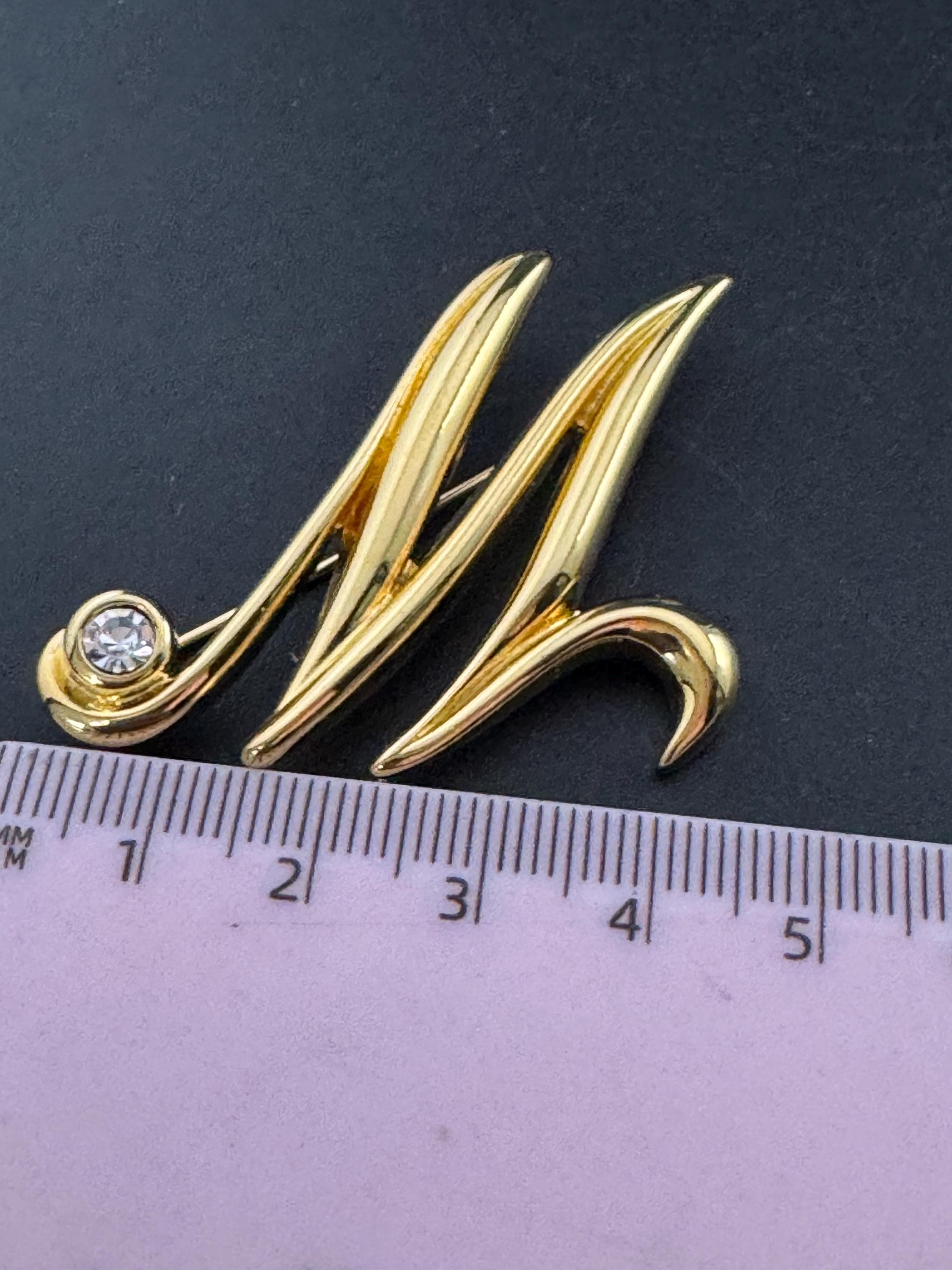 Signed MONET letter M monogram name brooch, gold tone 5cm