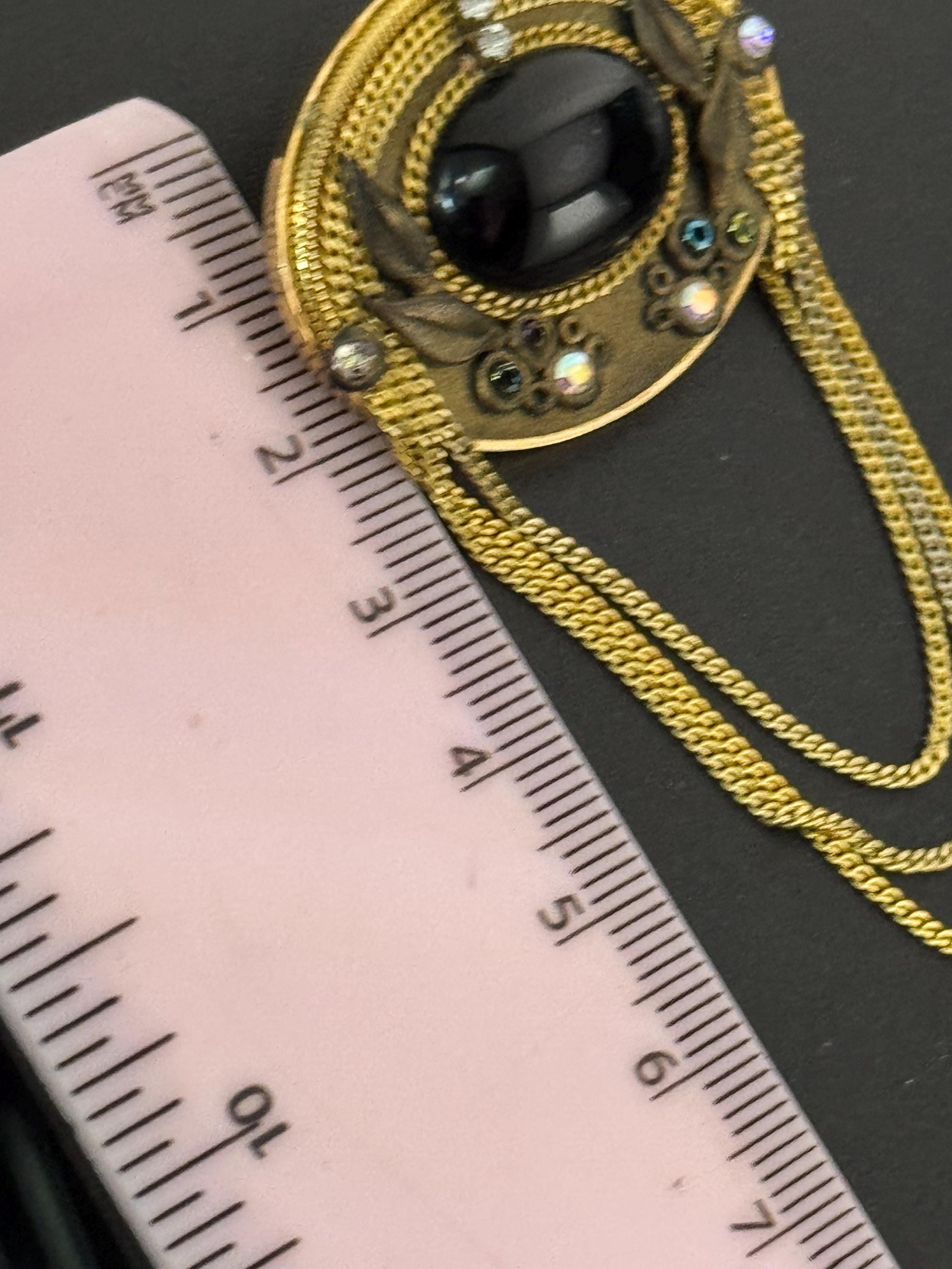signed Marena west Germany cabochon brooch, set with rhinestones and chains 18k gold plated