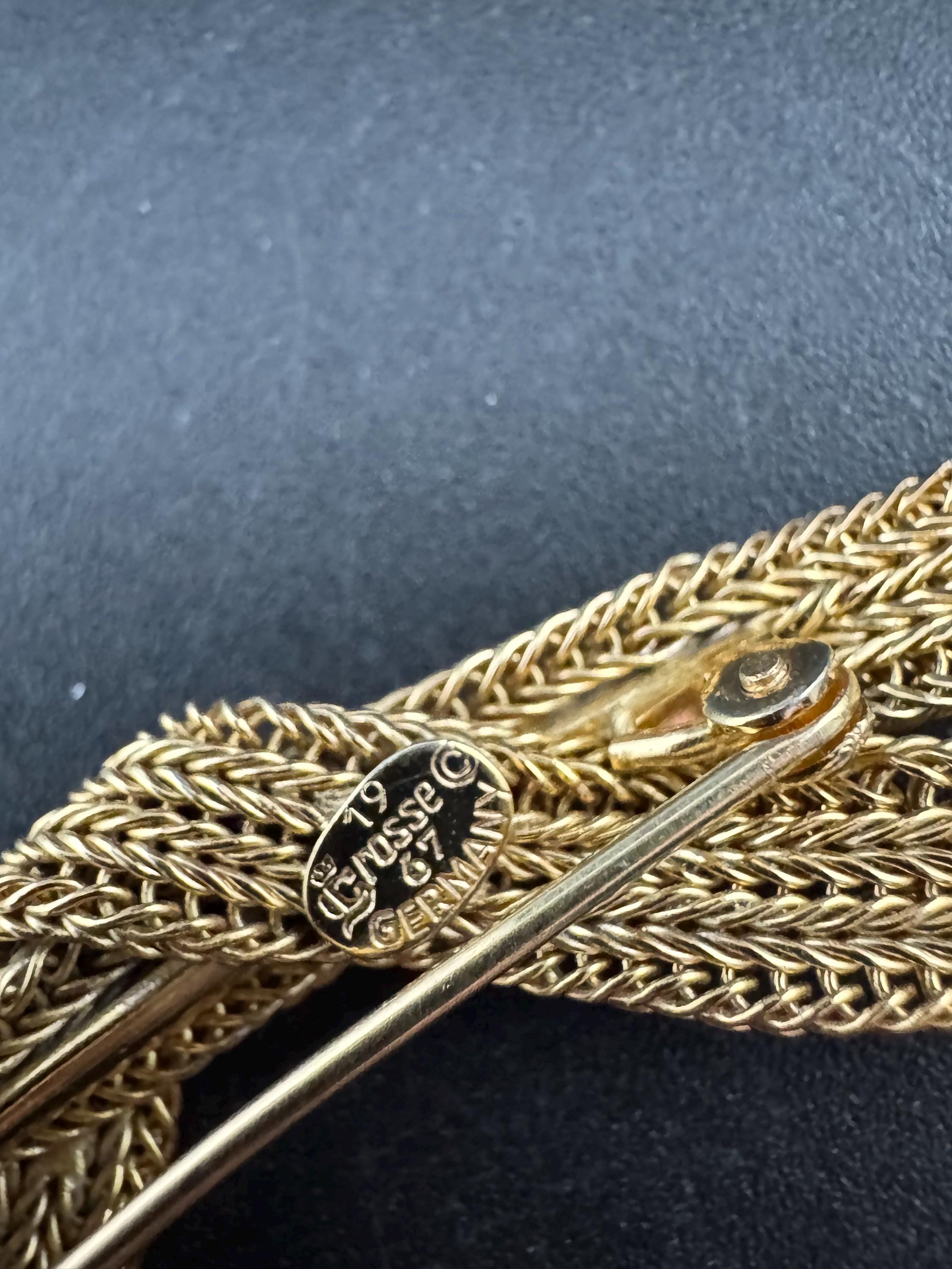 Signed 1957 grosse classic mesh knot brooch, designer gold plated