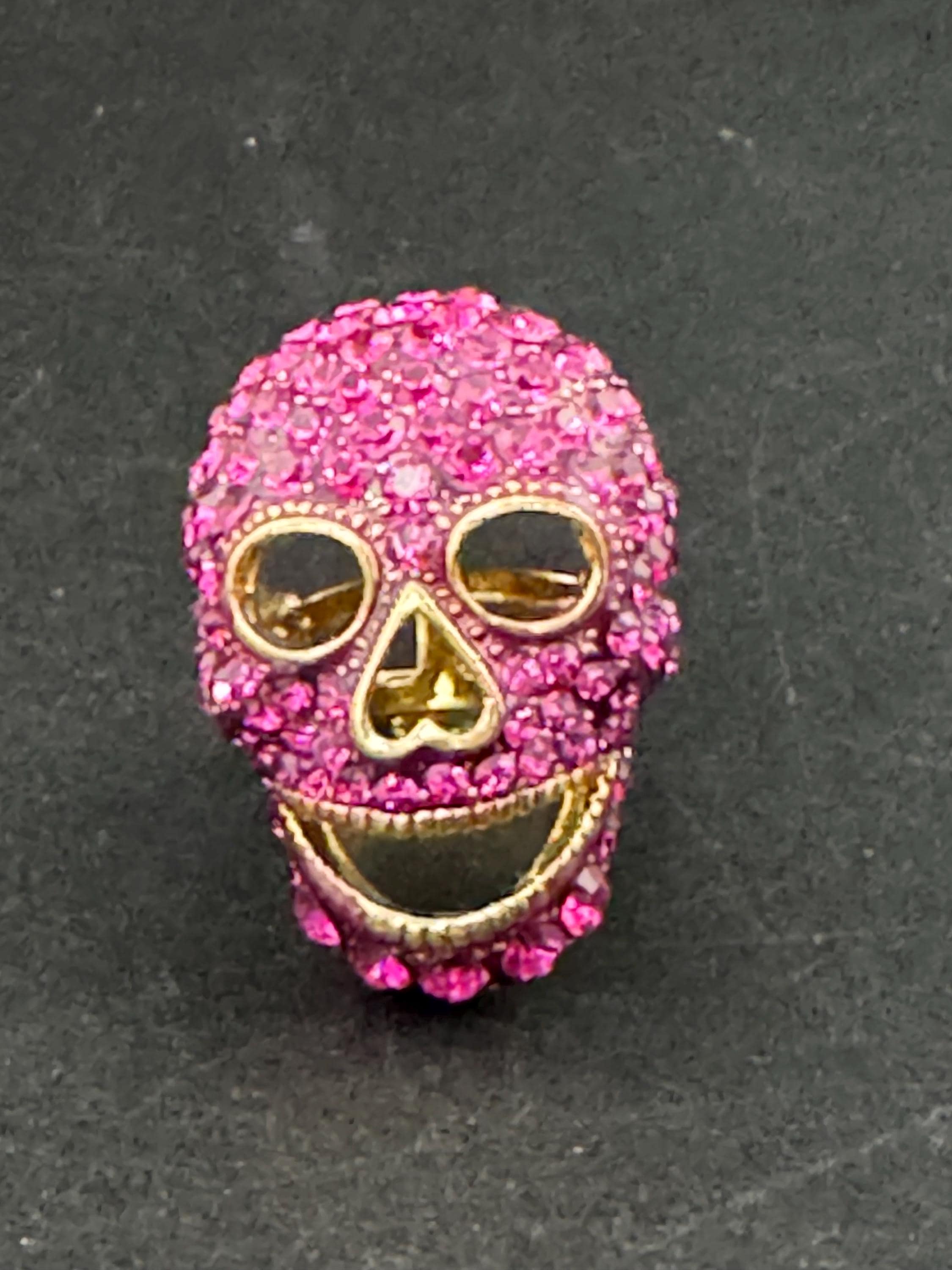 retro pink rhinestone skull ring by butler and Wilson , adjustable and signed