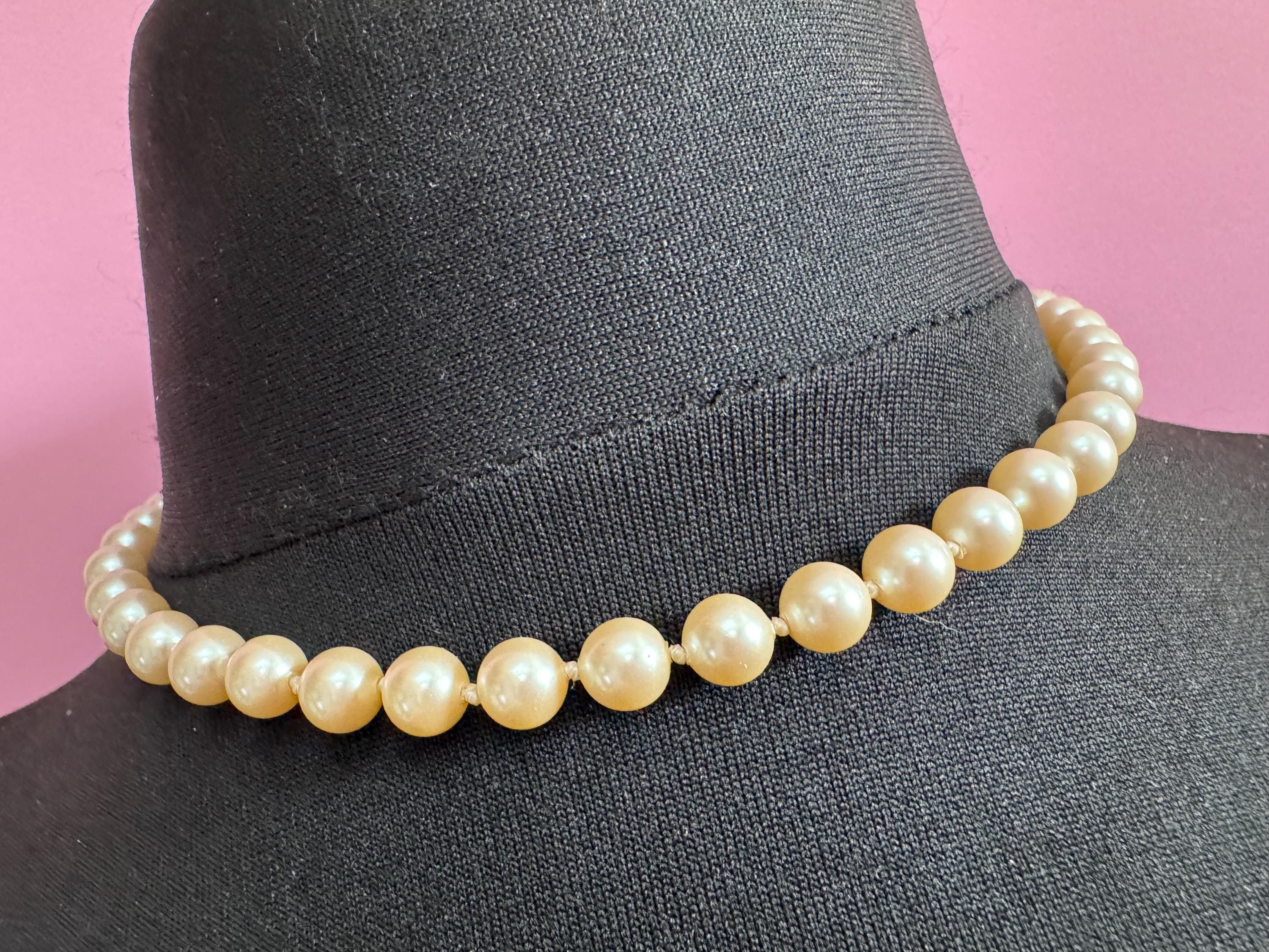 Signed Pierre Cardin Classic ivory glass pearl collar necklace, individually knotted beads 42cm gold tone
