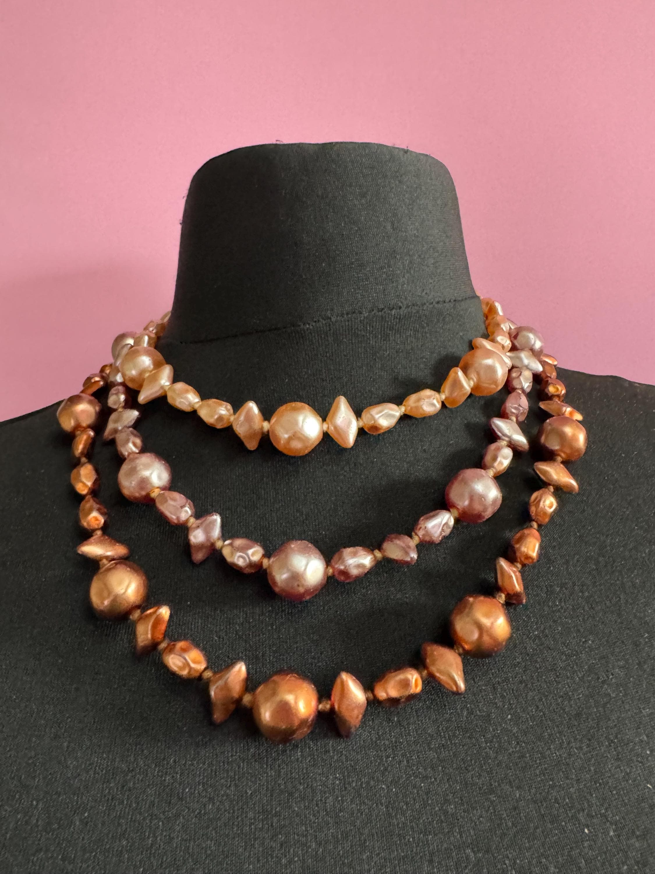 Fantastic Vintage triple strand row brown pink bronze glass faux pearl beaded multistrand necklace with a huge glass cabochon clasp