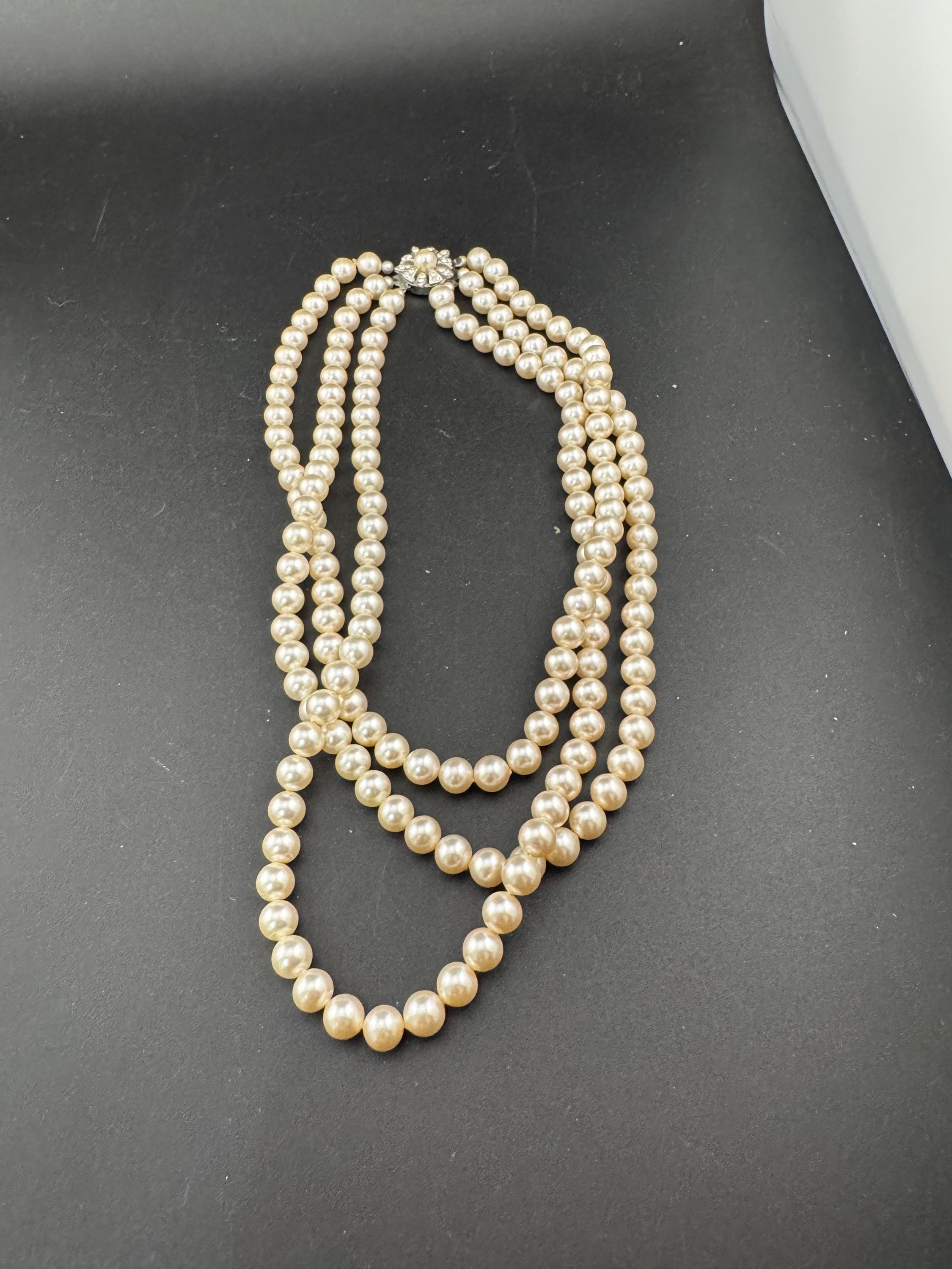 Vintage Triple 3 strand row faux glass pearl long Multistrand necklace , ornate clear rhinestone clasp