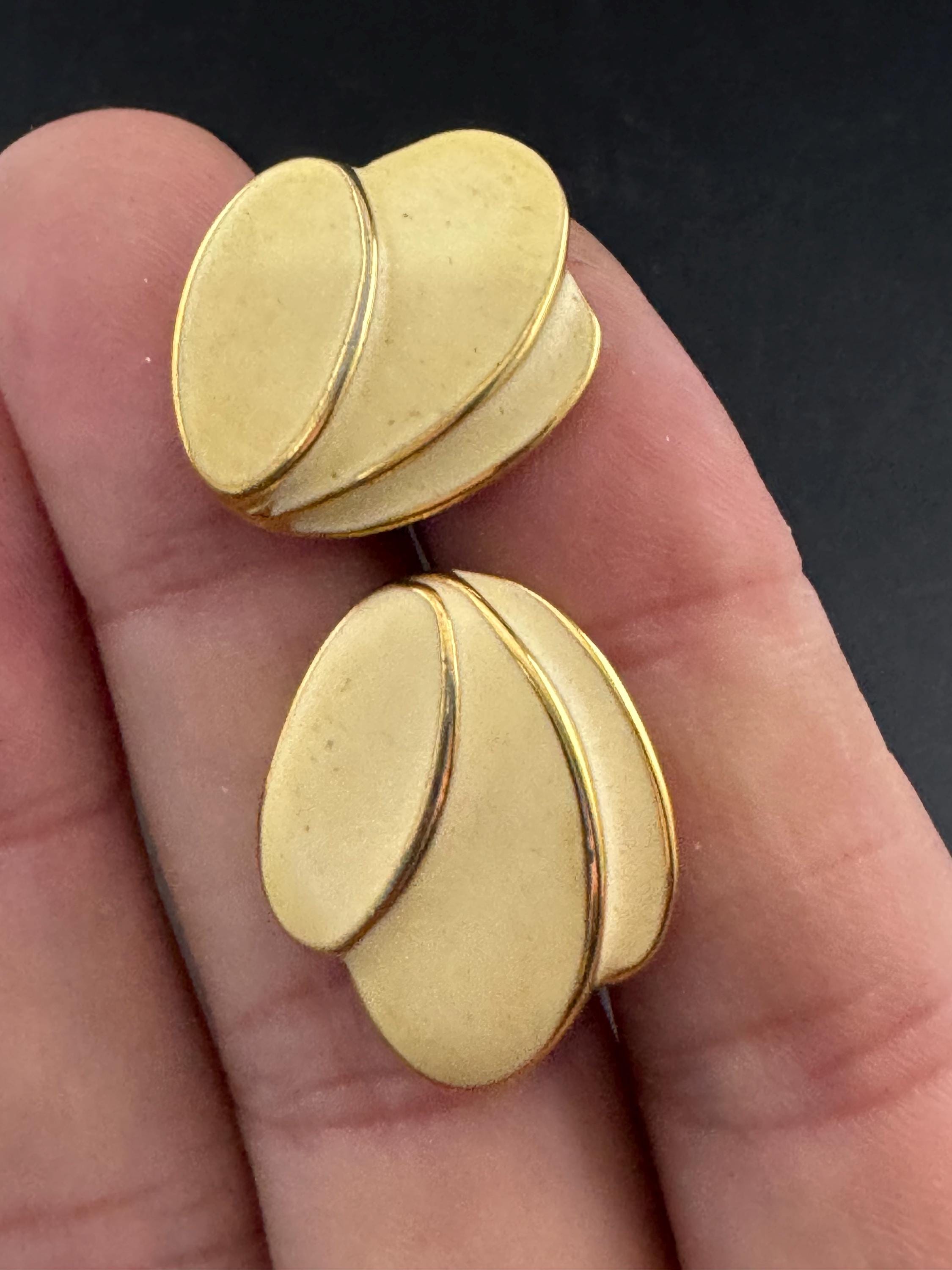 Signed Napier cream enamel pair stud earrings, gold tone pierced
