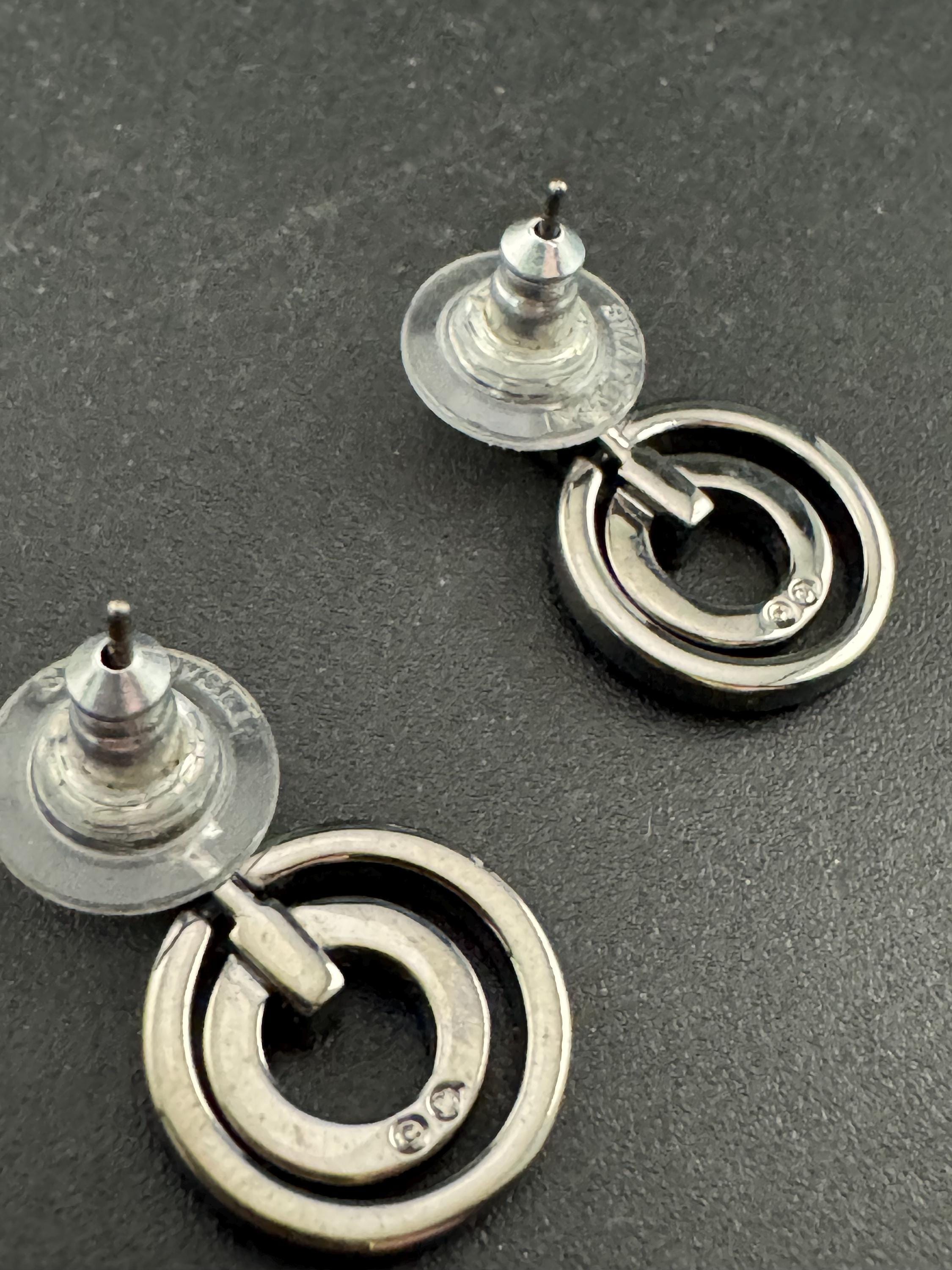 Signed Swarovski silver tone geometric clear crystal pierced drop earrings