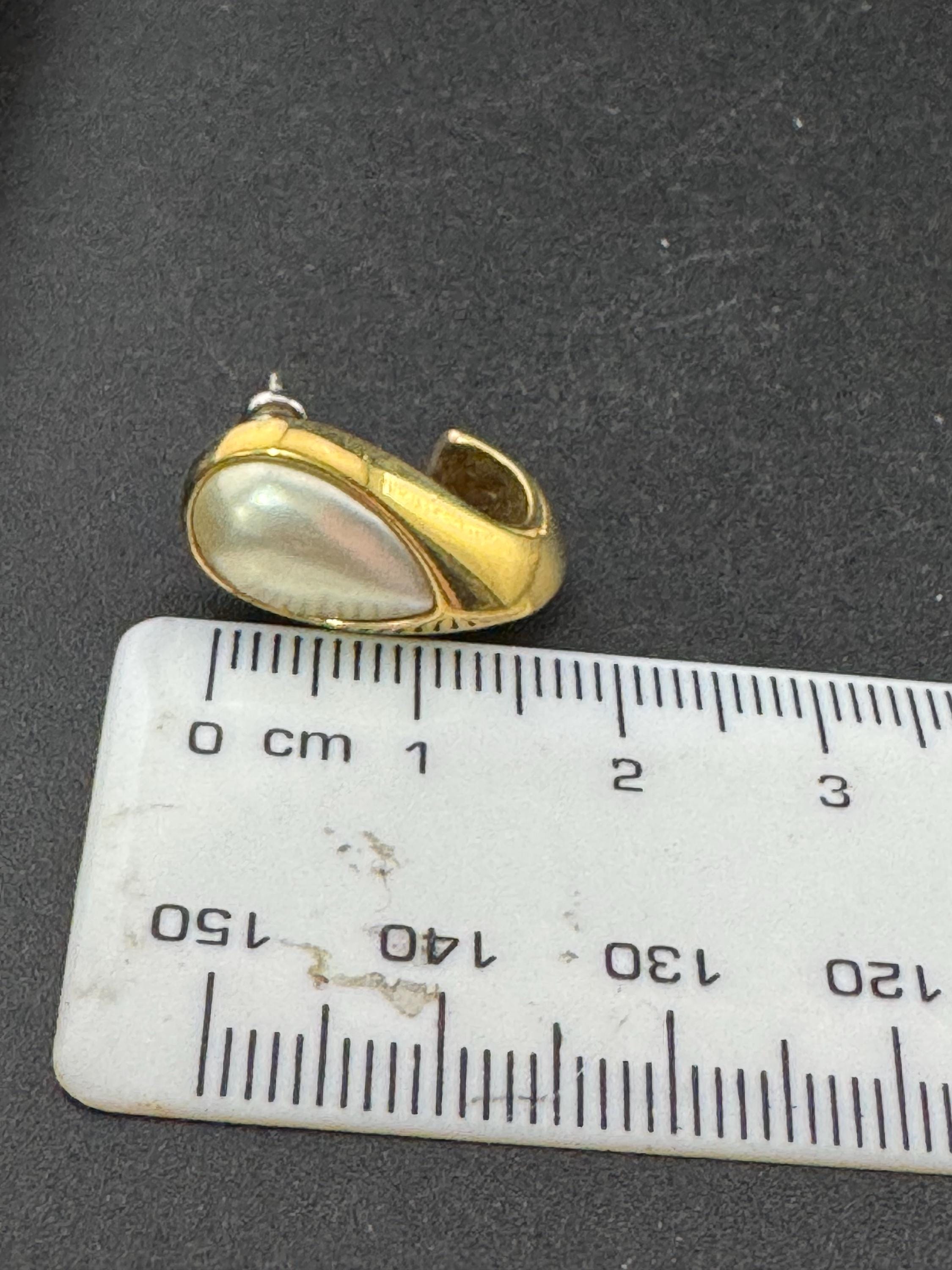 Vintage small dainty gold tone surround with modernist white faux pearl oval cabochon 1.75cm stud earrings for pierced ears
