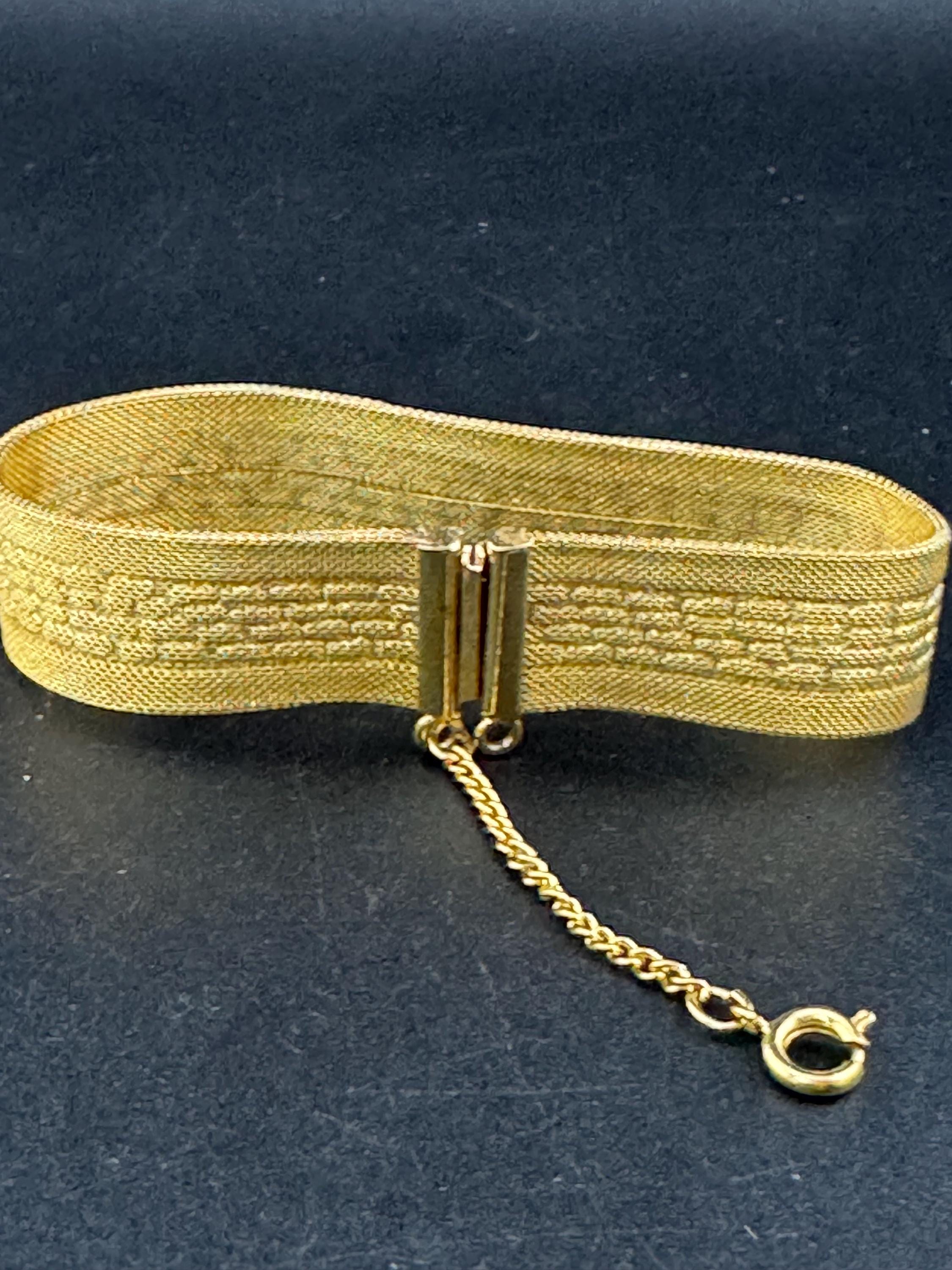 1970s geometric design bright gold plated articulated flat wide mesh bracelet with safety chain