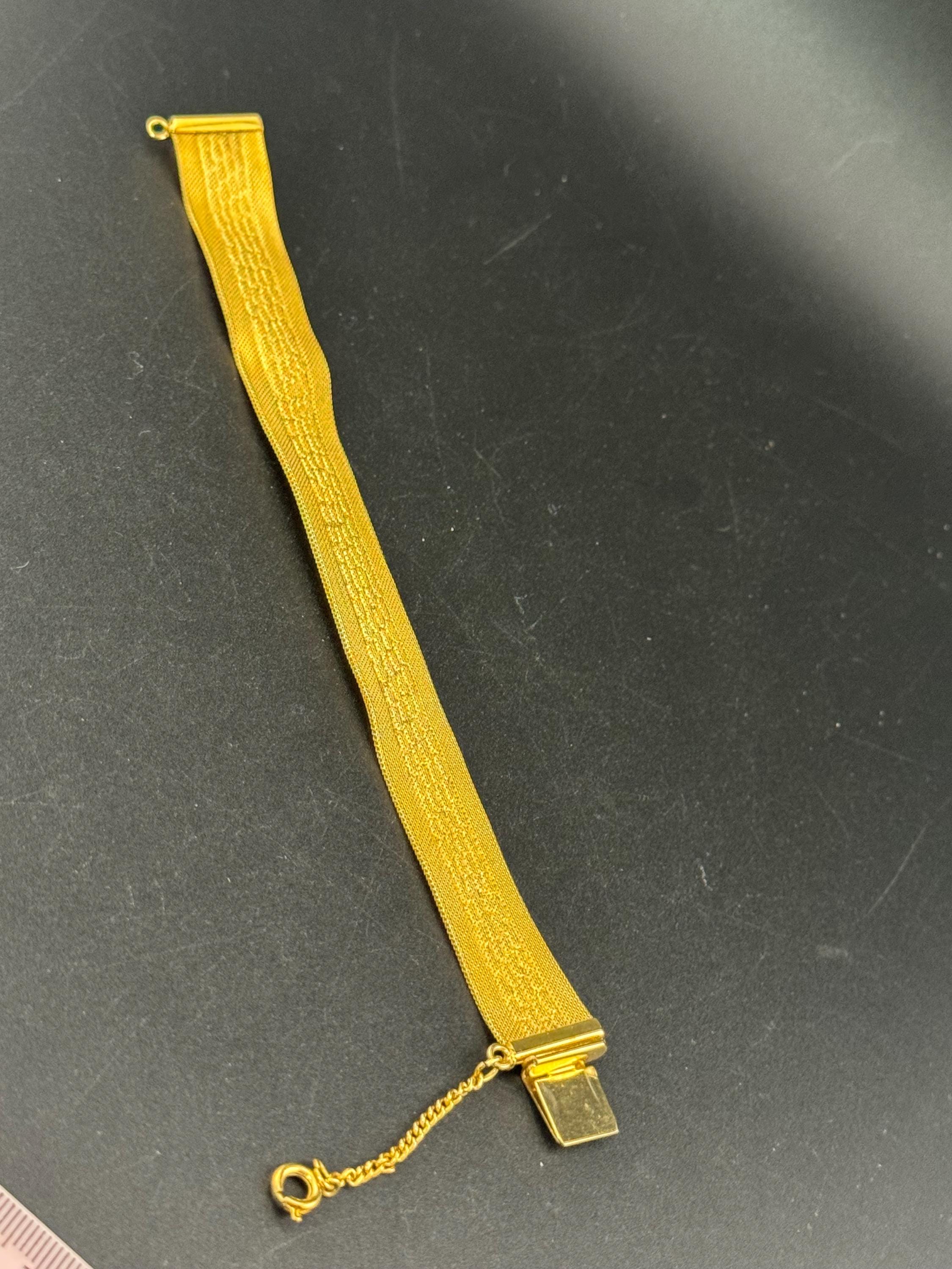 1970s geometric design bright gold plated articulated flat wide mesh bracelet with safety chain