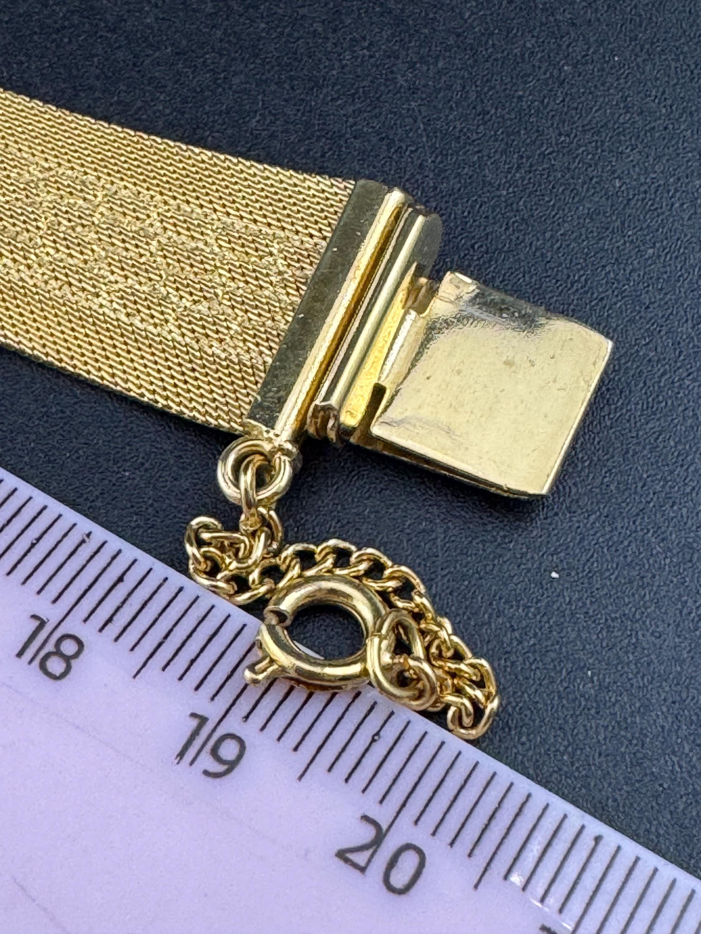 1970s geometric design bright gold plated articulated flat wide mesh bracelet with safety chain