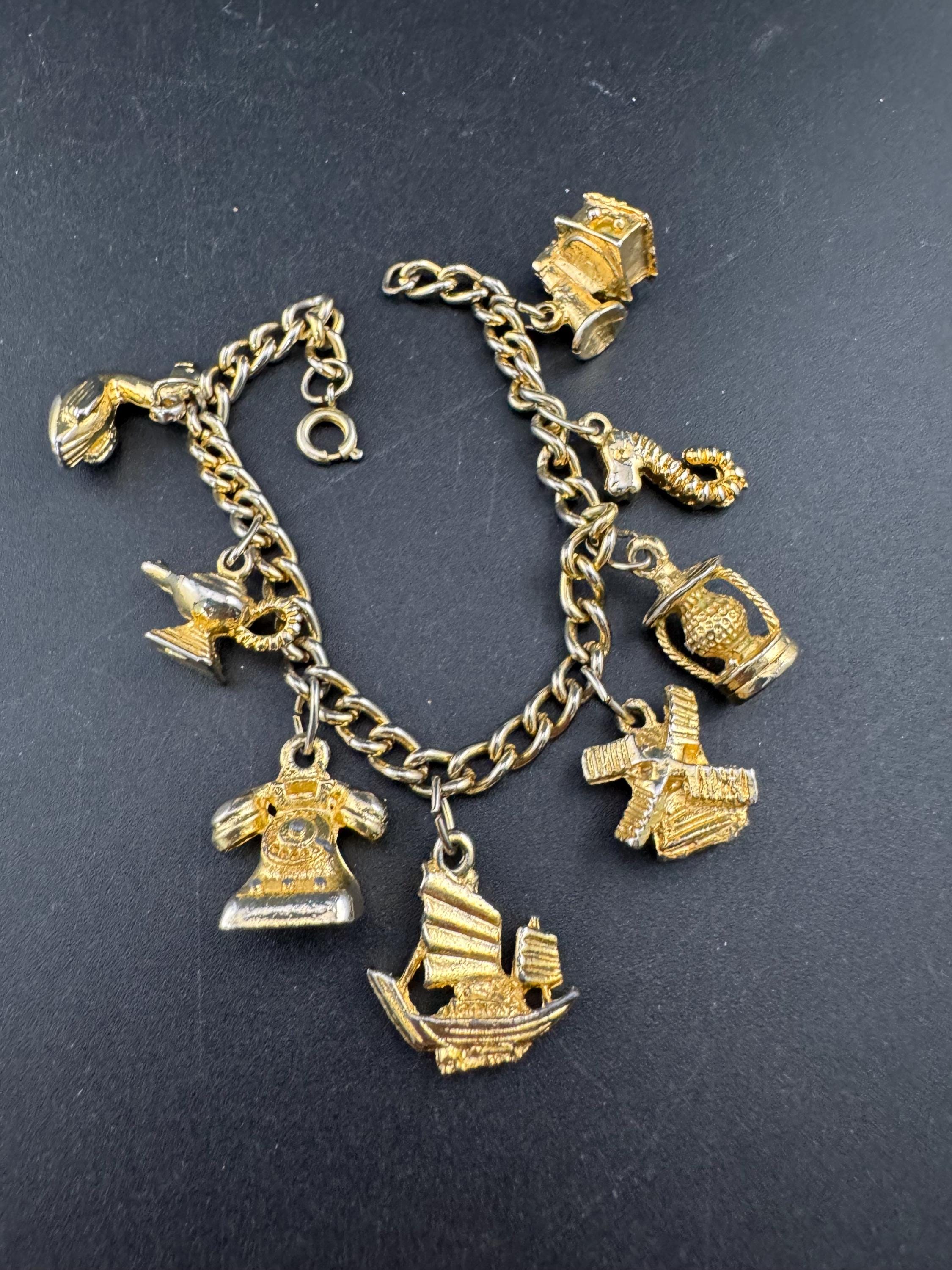 Vintage retro Gold tone chain link charm bracelet windmill seahorse lamp boat lantern telephone 19cm long