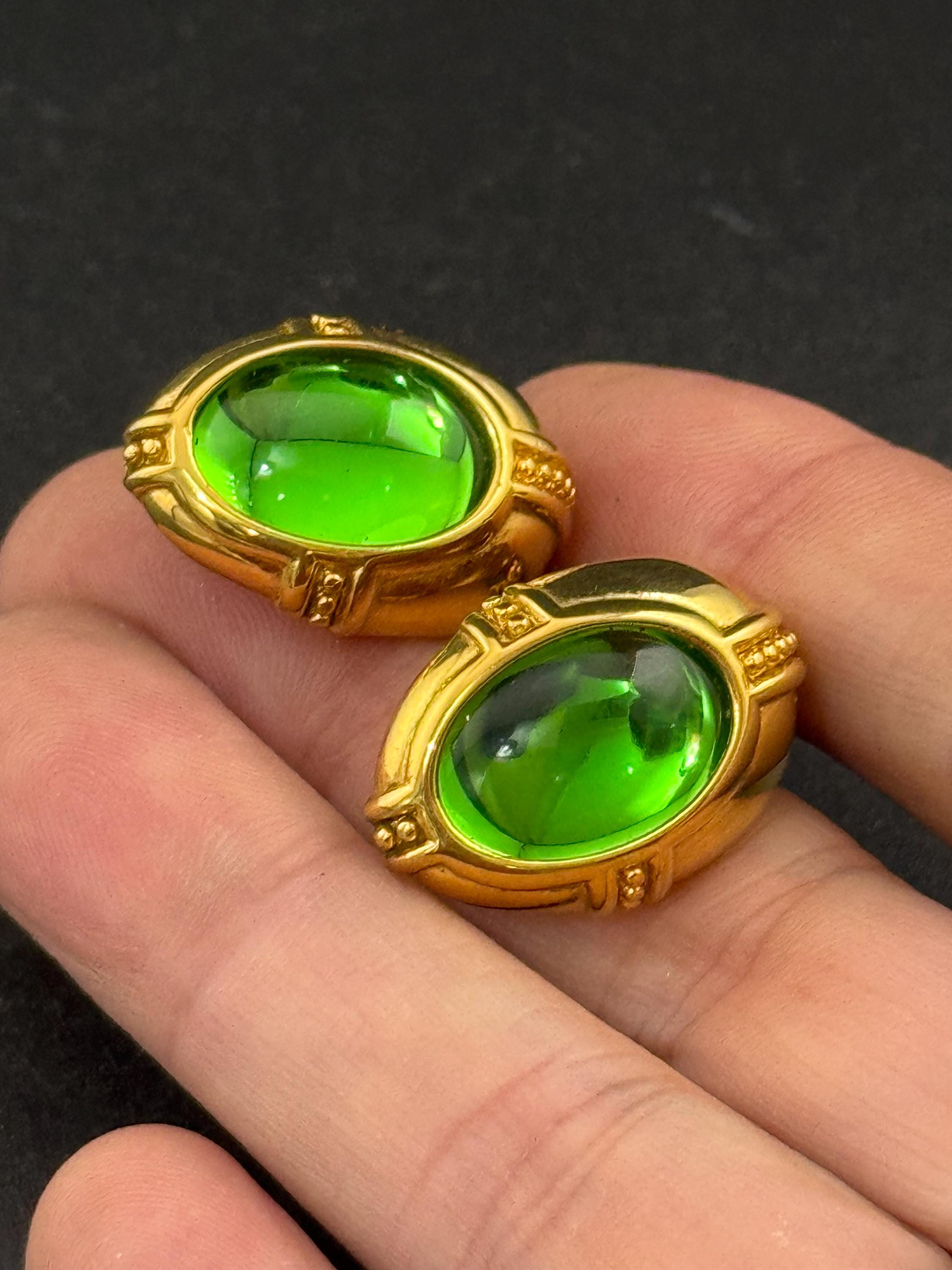 Signed Joan rivers bright green glass cabochon gold plated oval clip on earrings