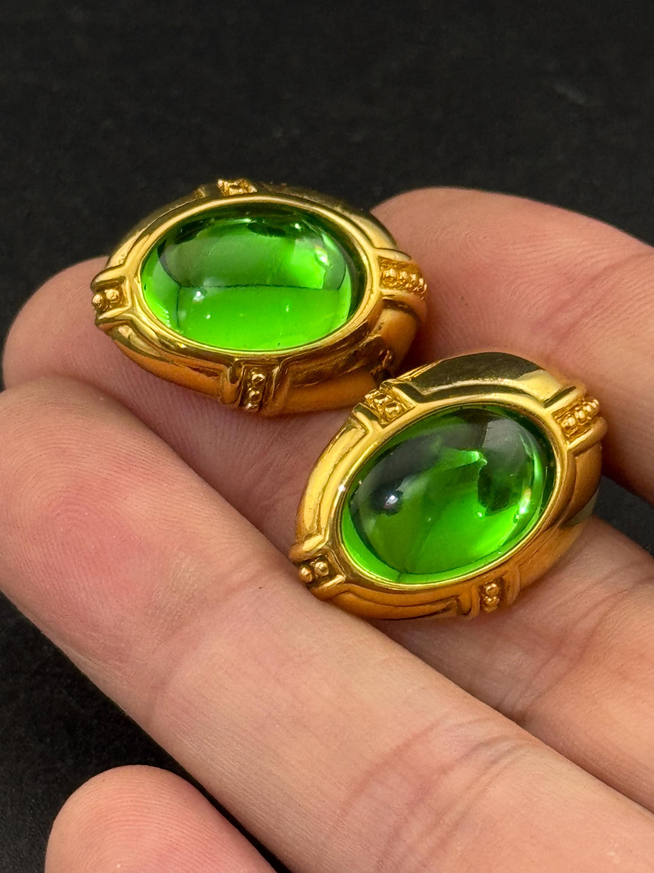 Signed Joan rivers bright green glass cabochon gold plated oval clip on earrings