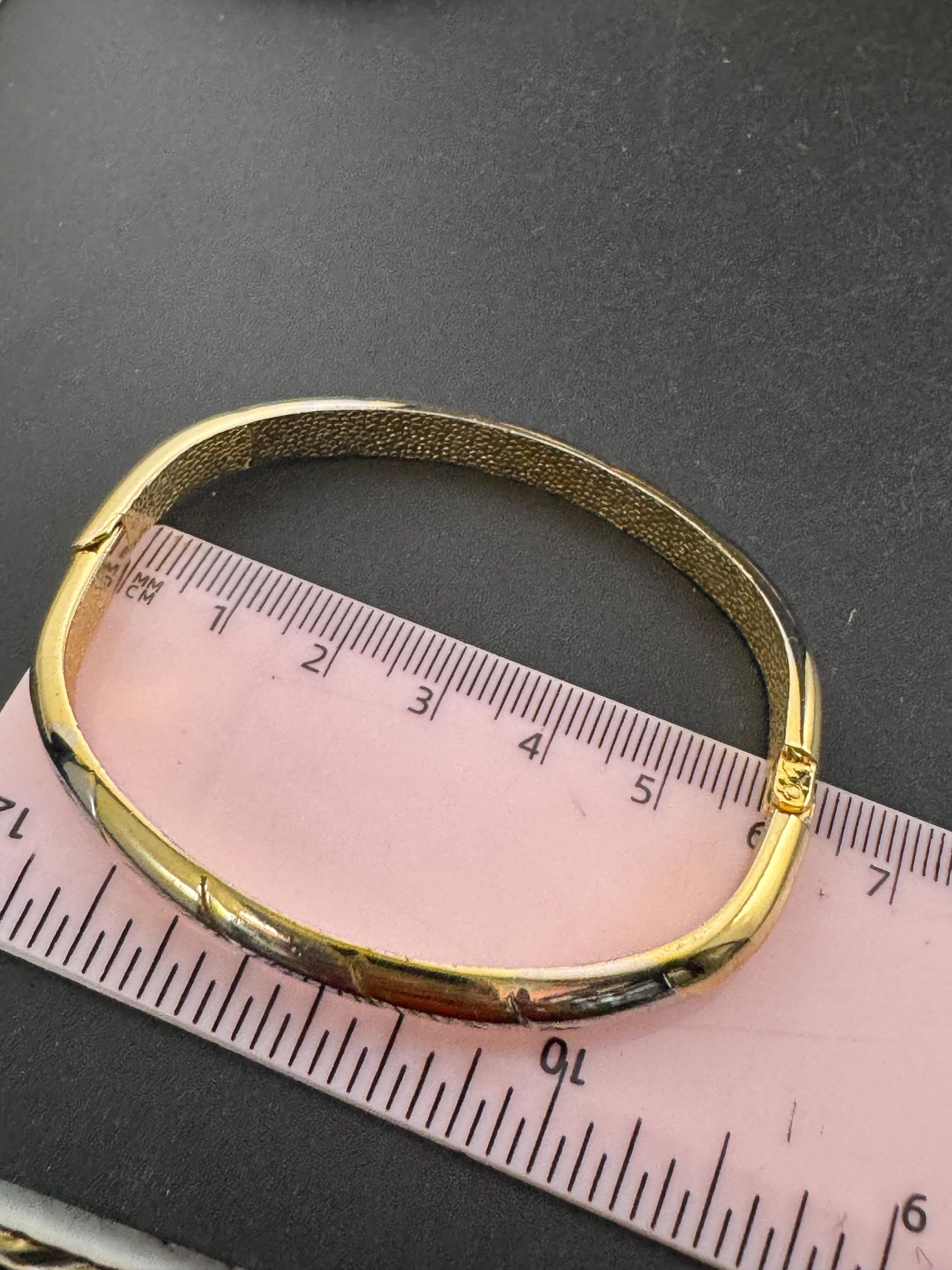 Vintage slim silver and gold tone striped hinged bangle bracelet
