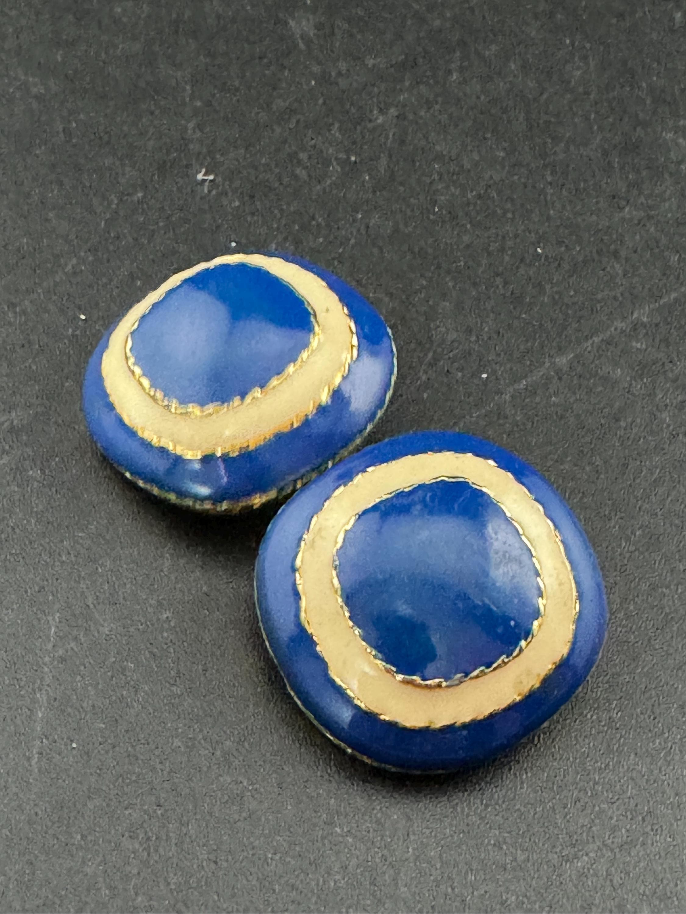 Vintage oversized blue and cream enamel gold tone clip on earrings