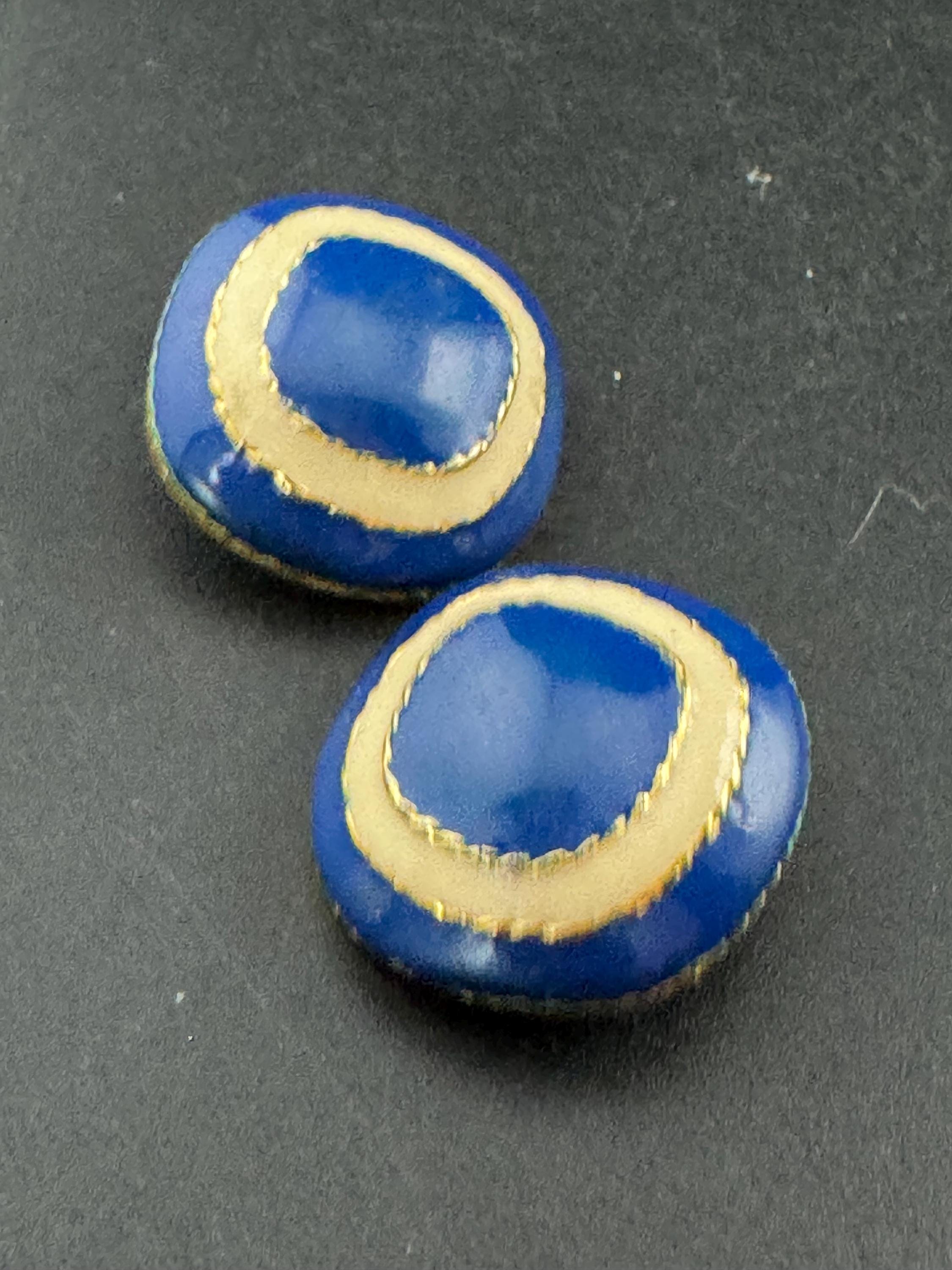 Vintage oversized blue and cream enamel gold tone clip on earrings