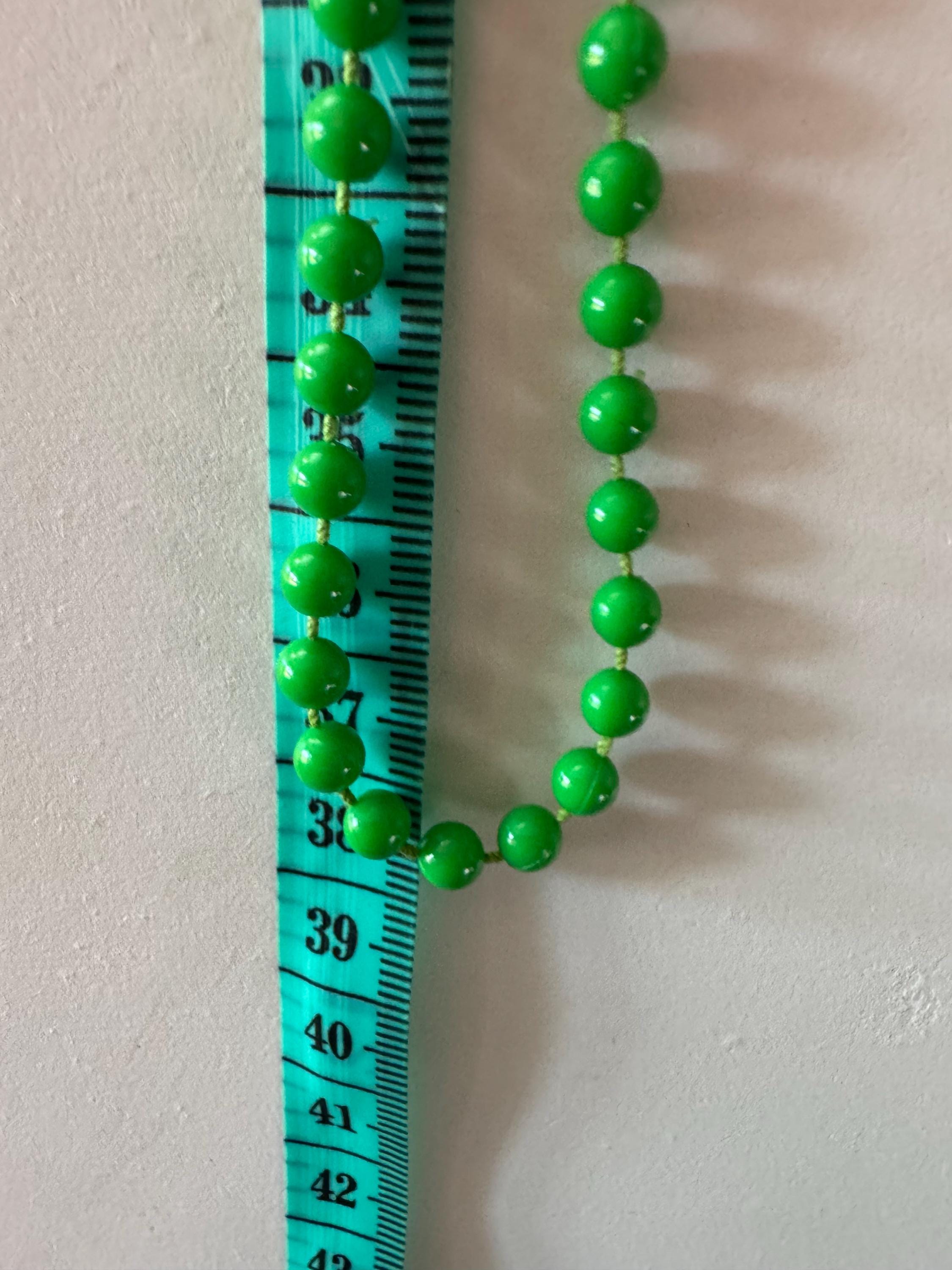 Vintage 1960s bright green and white plastic beaded long tassel necklace 76cm long