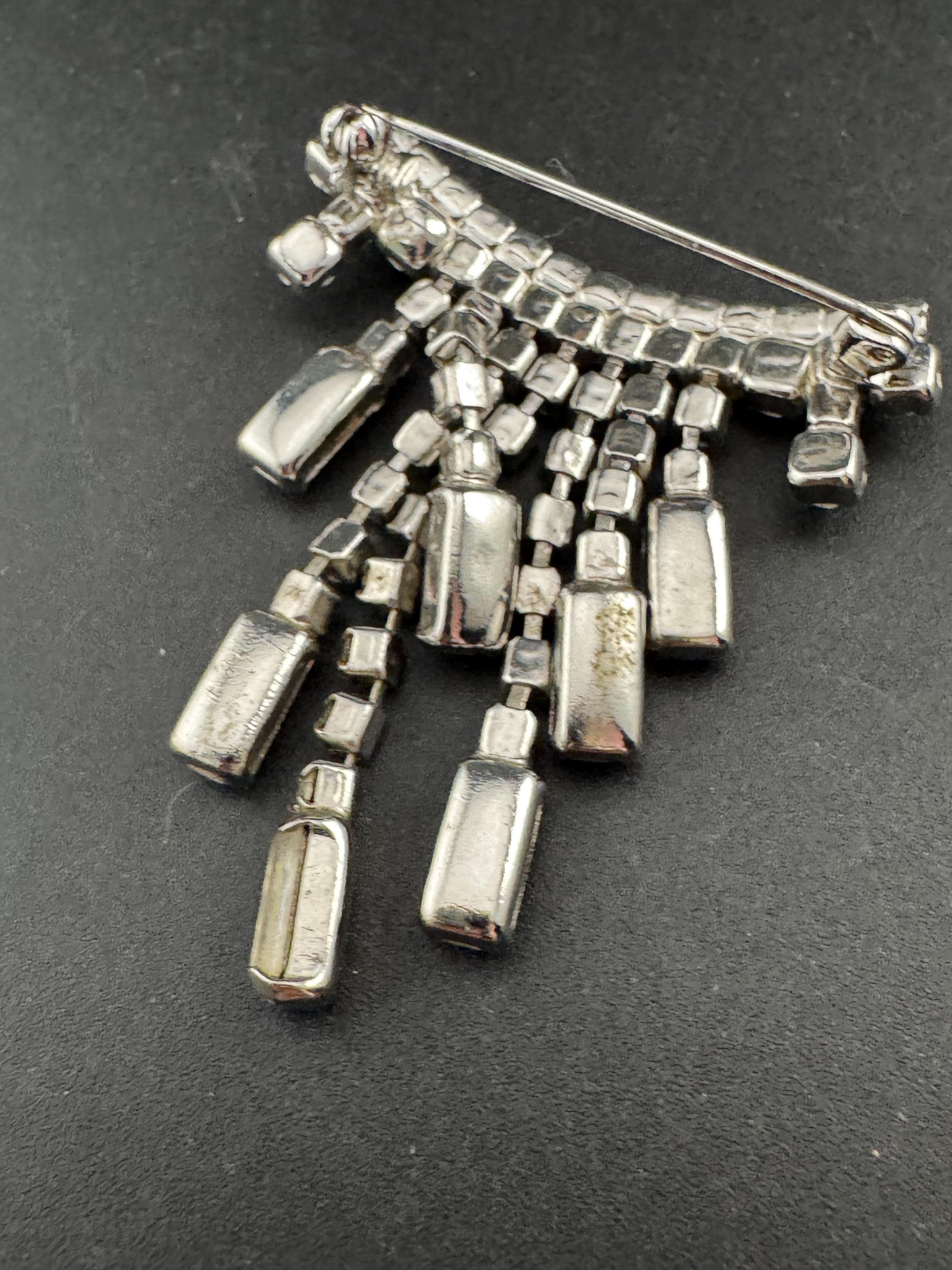 1980s clear Diamanté Tassel Brooch: Art Deco style Silver Tone