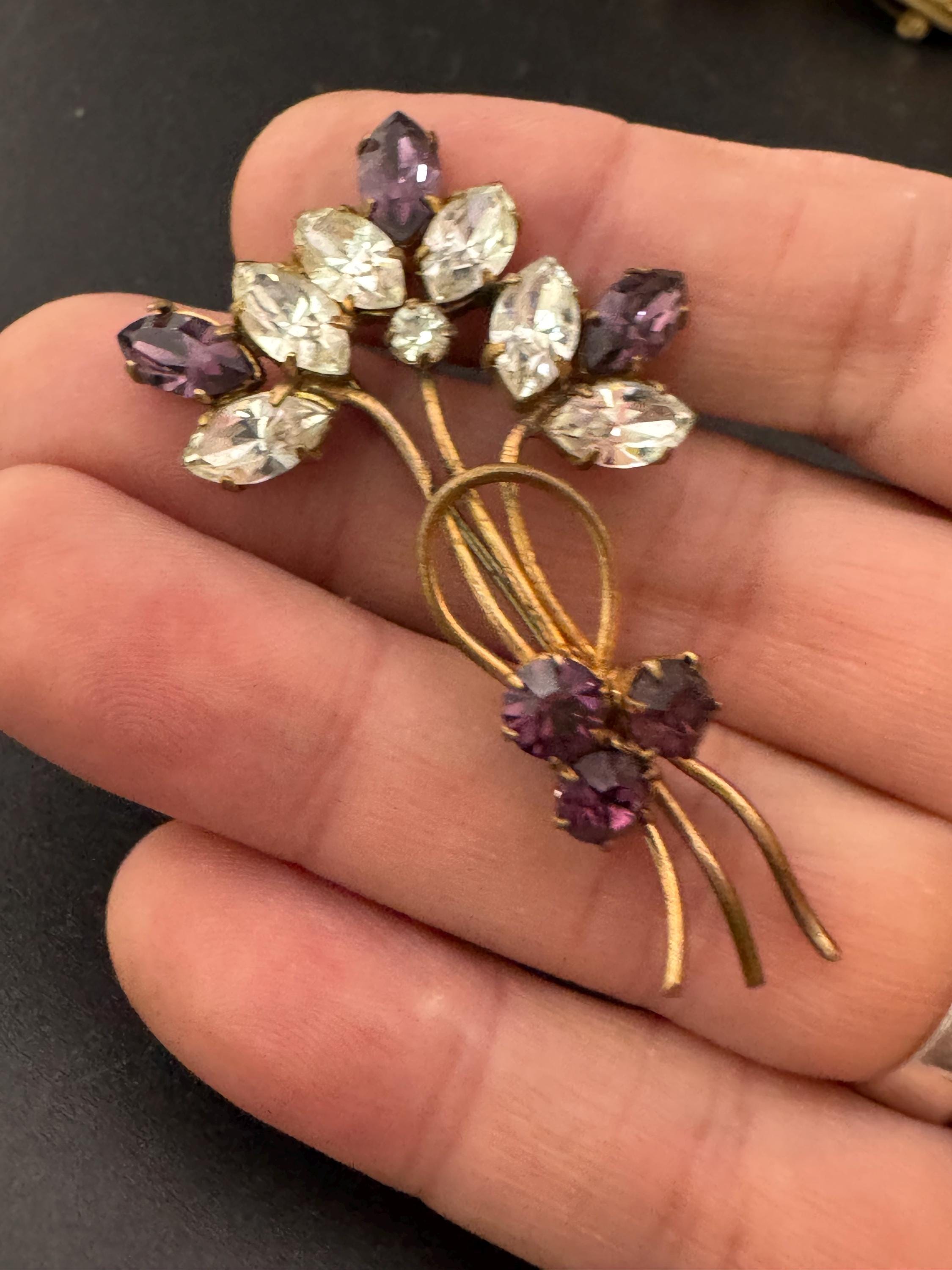 Vintage dainty amethyst purple glass rhinestone gold tone floral brooch , mid century