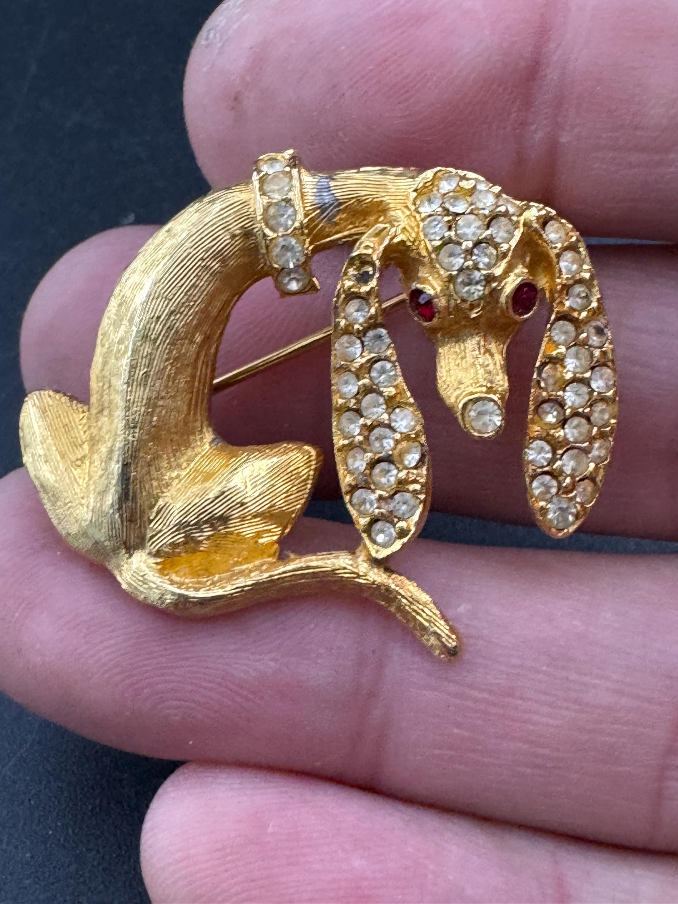 Mid century Dachshund sausage dog rhinestone brooch, Gold tone