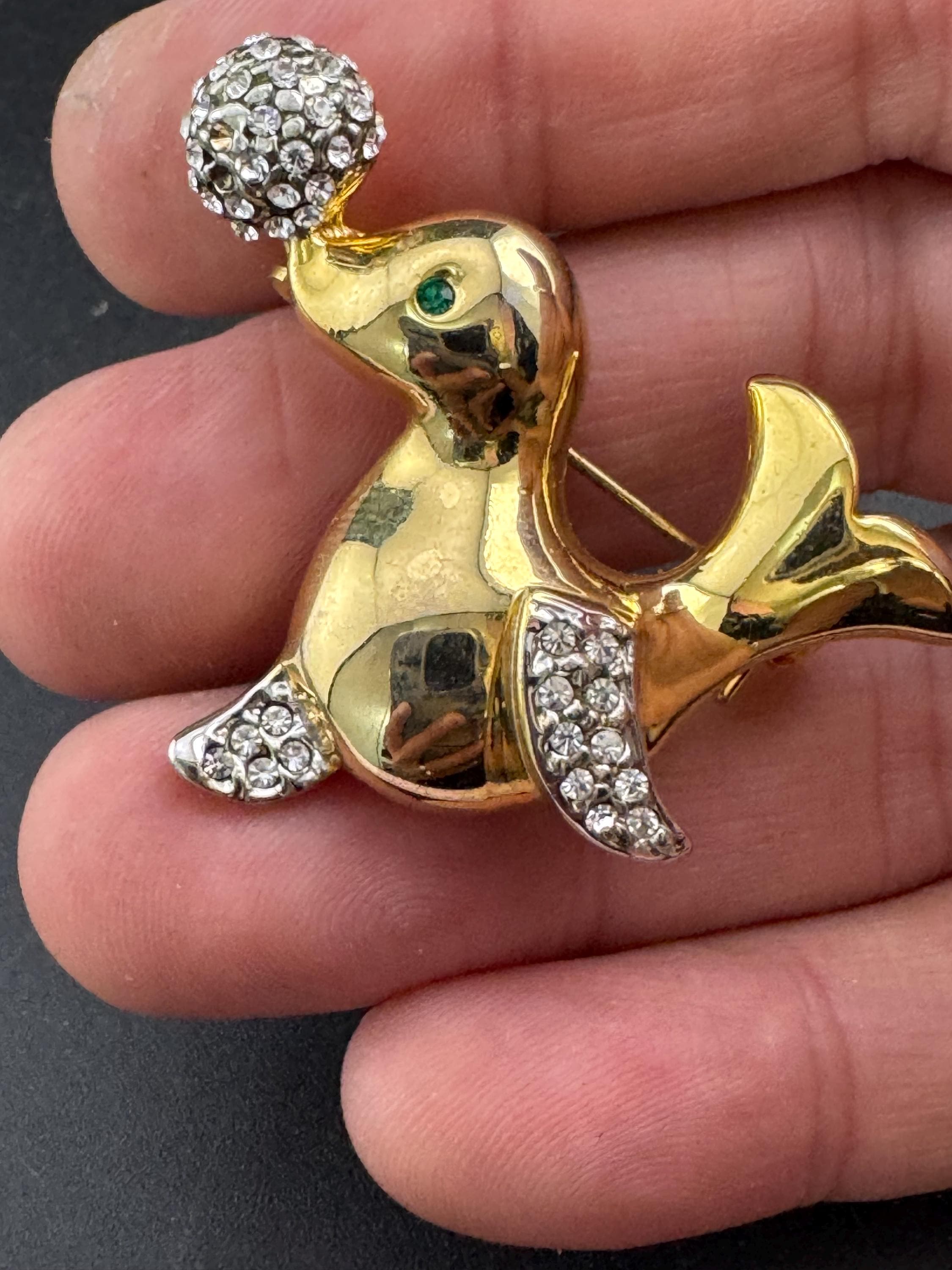Vintage gold plated seal brooch, crystal rhinestones