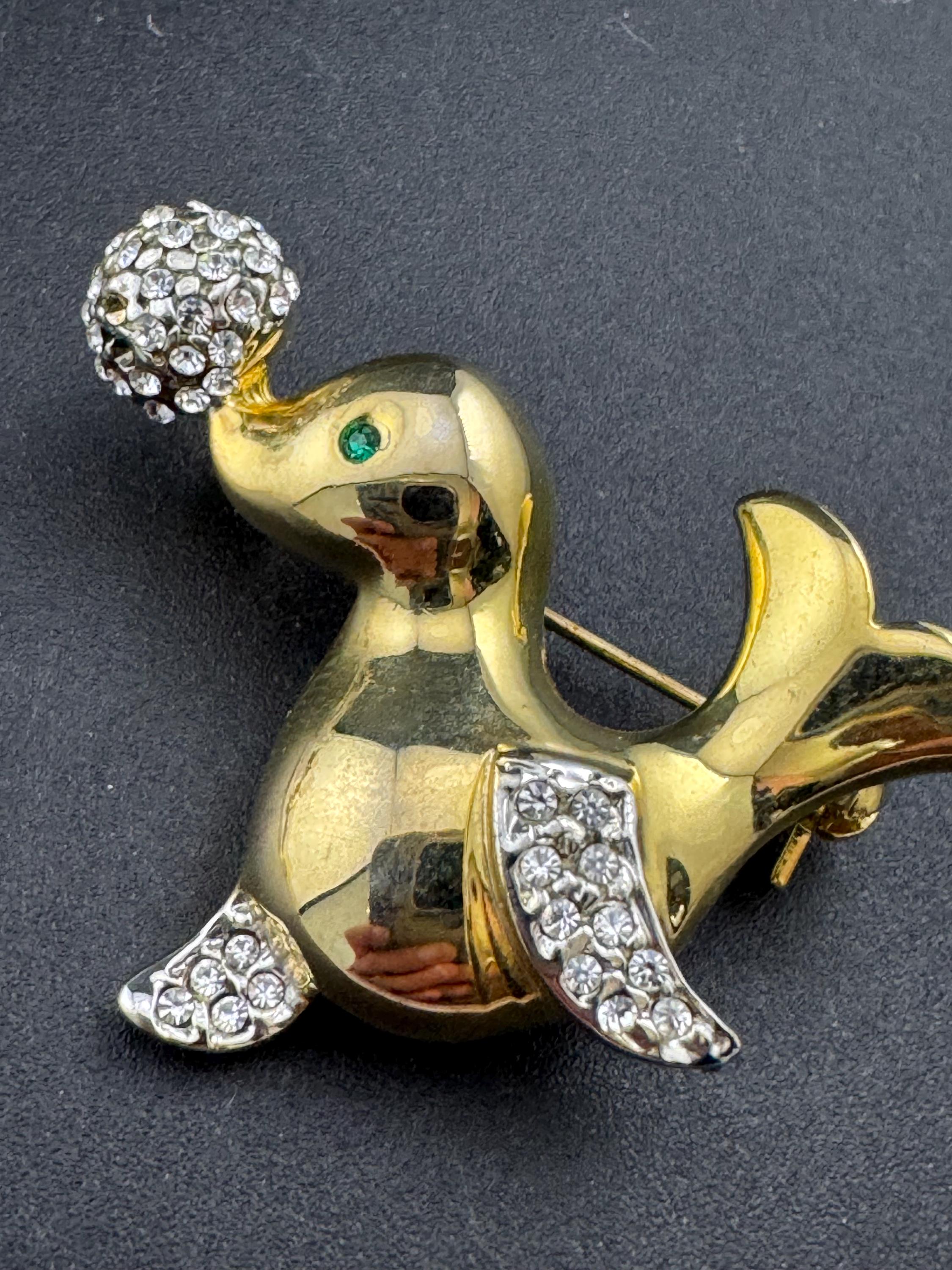 Vintage gold plated seal brooch, crystal rhinestones