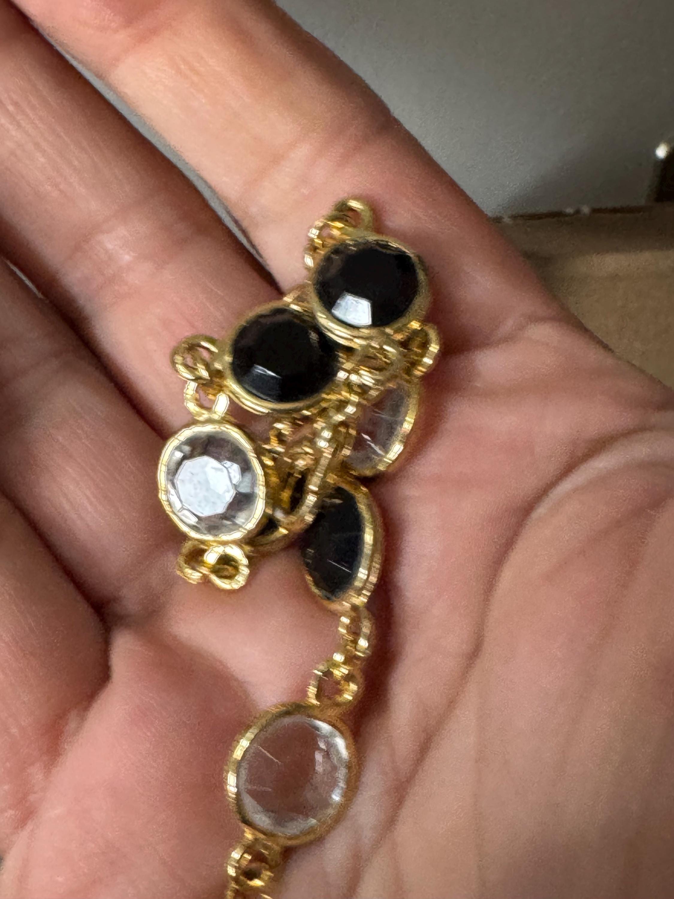Vintage black and clear round bezel set gold tone open backed rivière bracelet 18.5cm