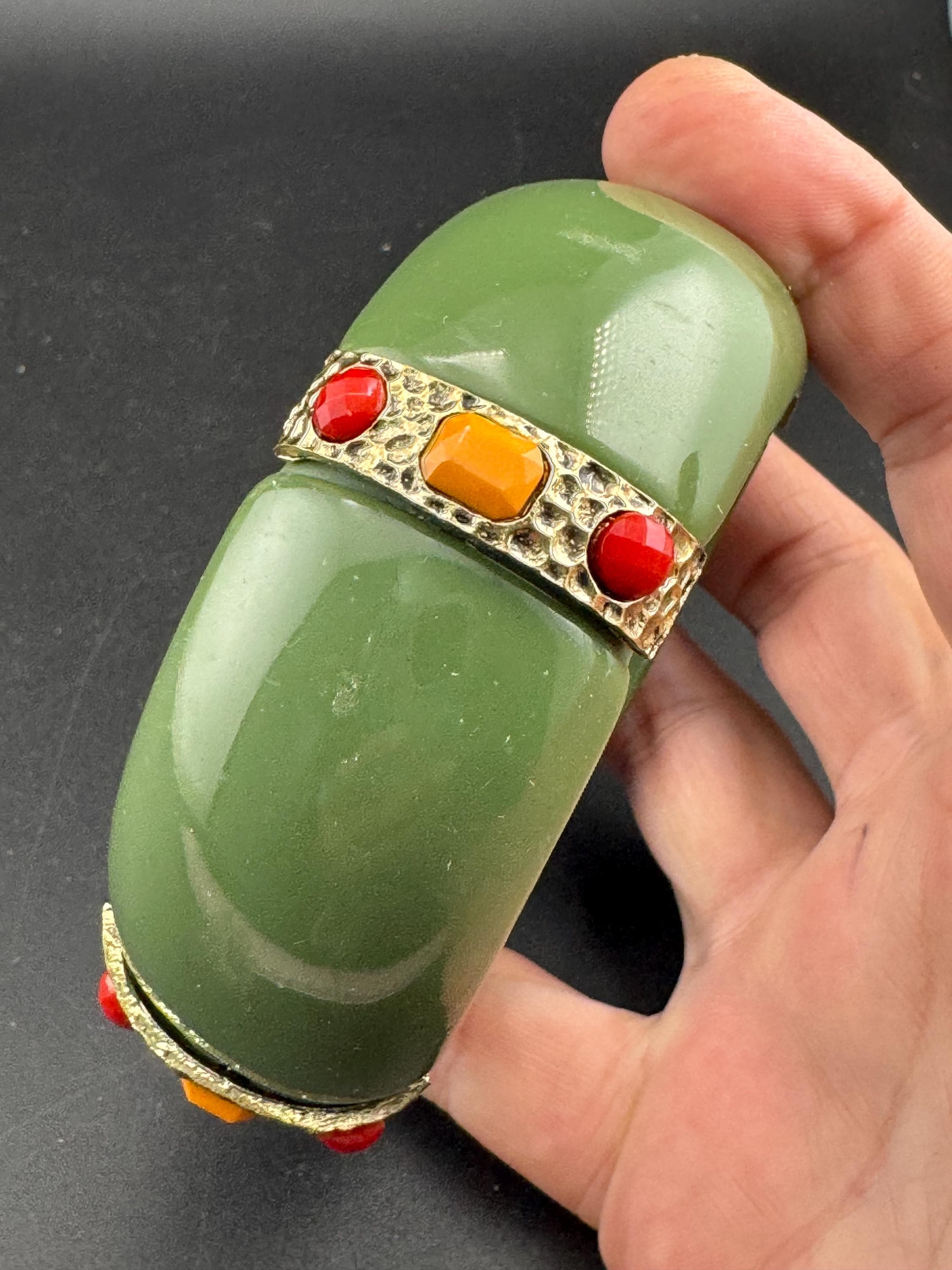 Vintage olive green wide marbled acrylic plastic bangle bracelet set with red orange cabochons