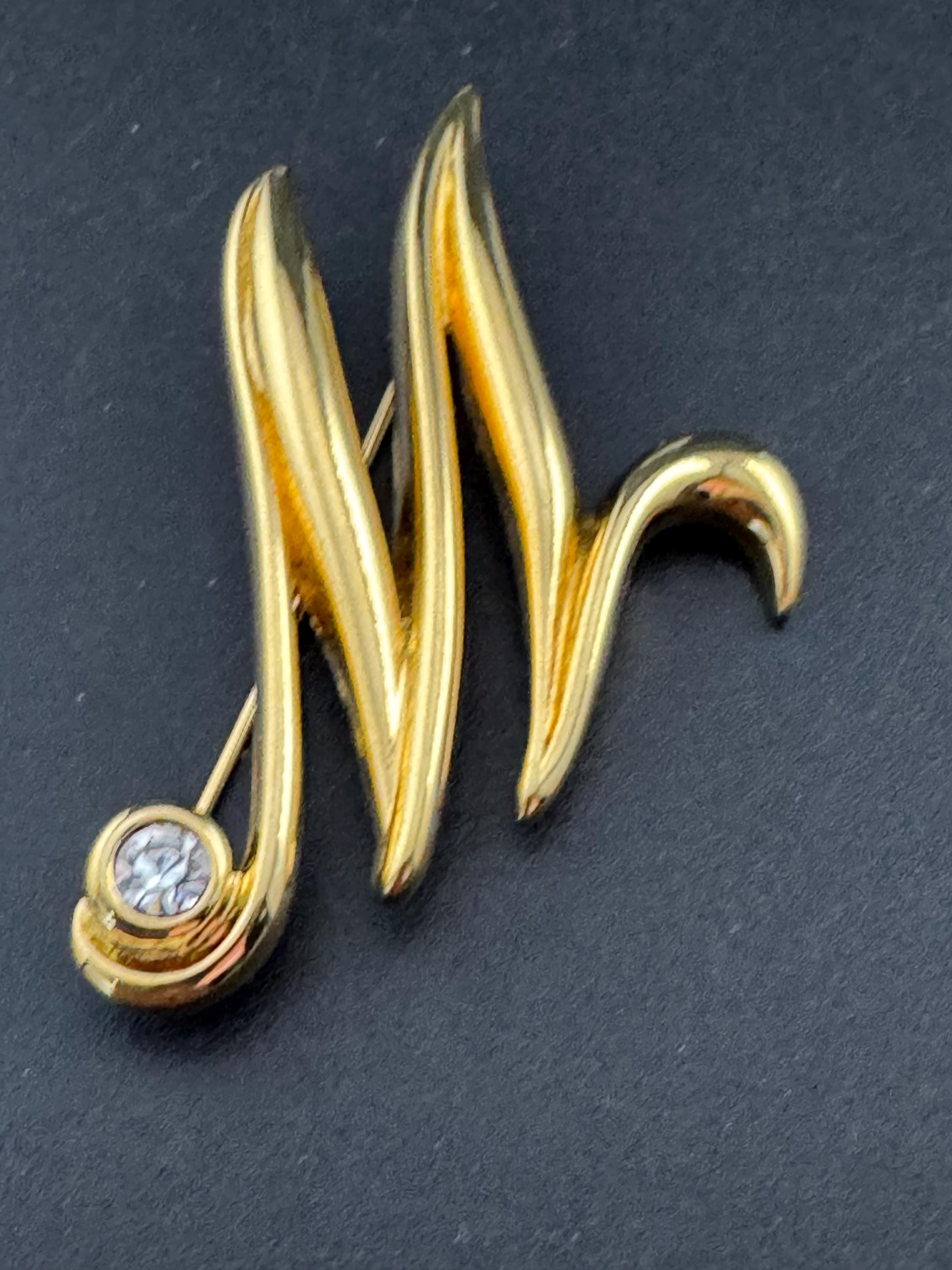 Signed MONET letter M monogram name brooch, gold tone 5cm