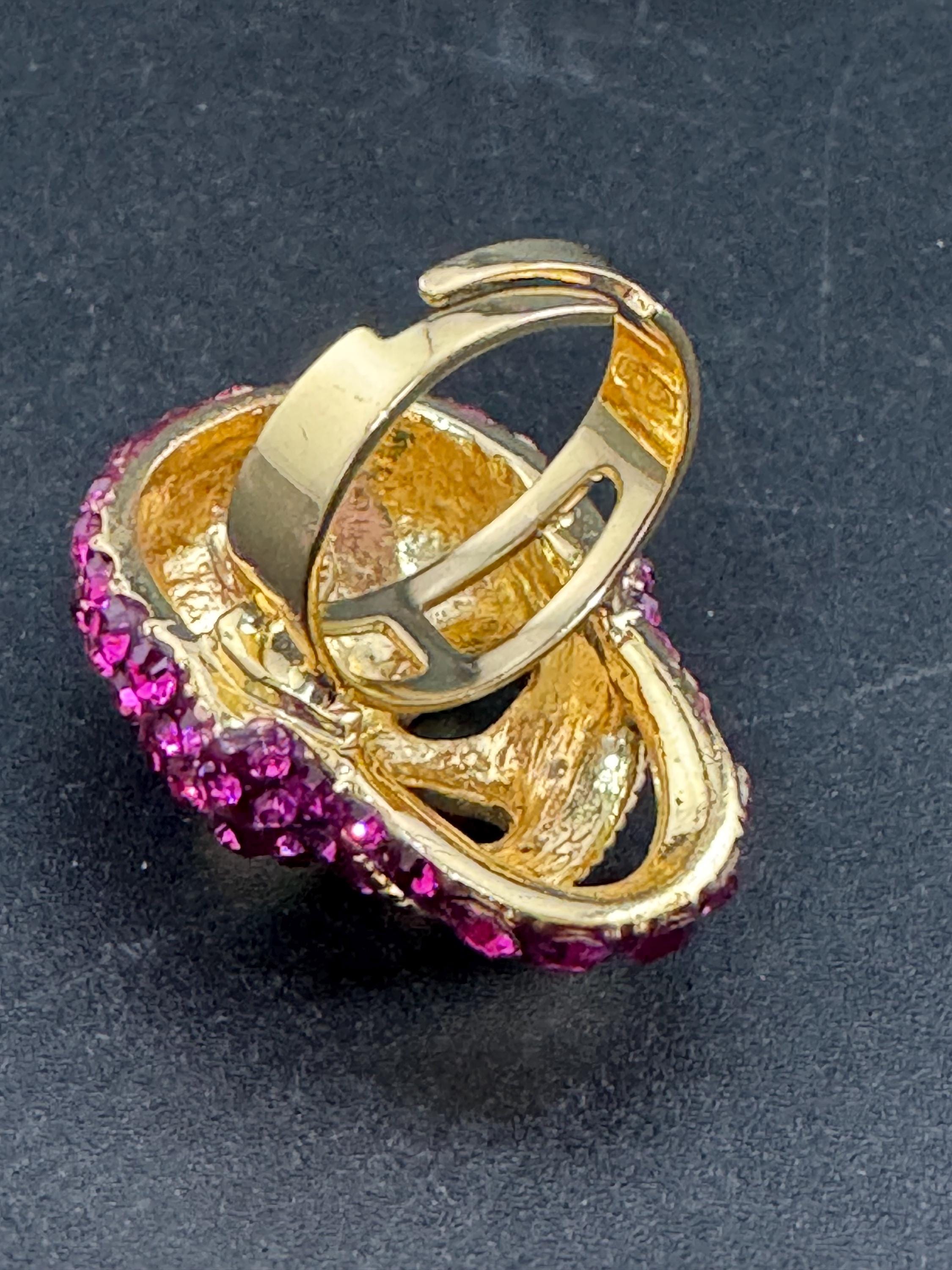 retro pink rhinestone skull ring by butler and Wilson , adjustable and signed