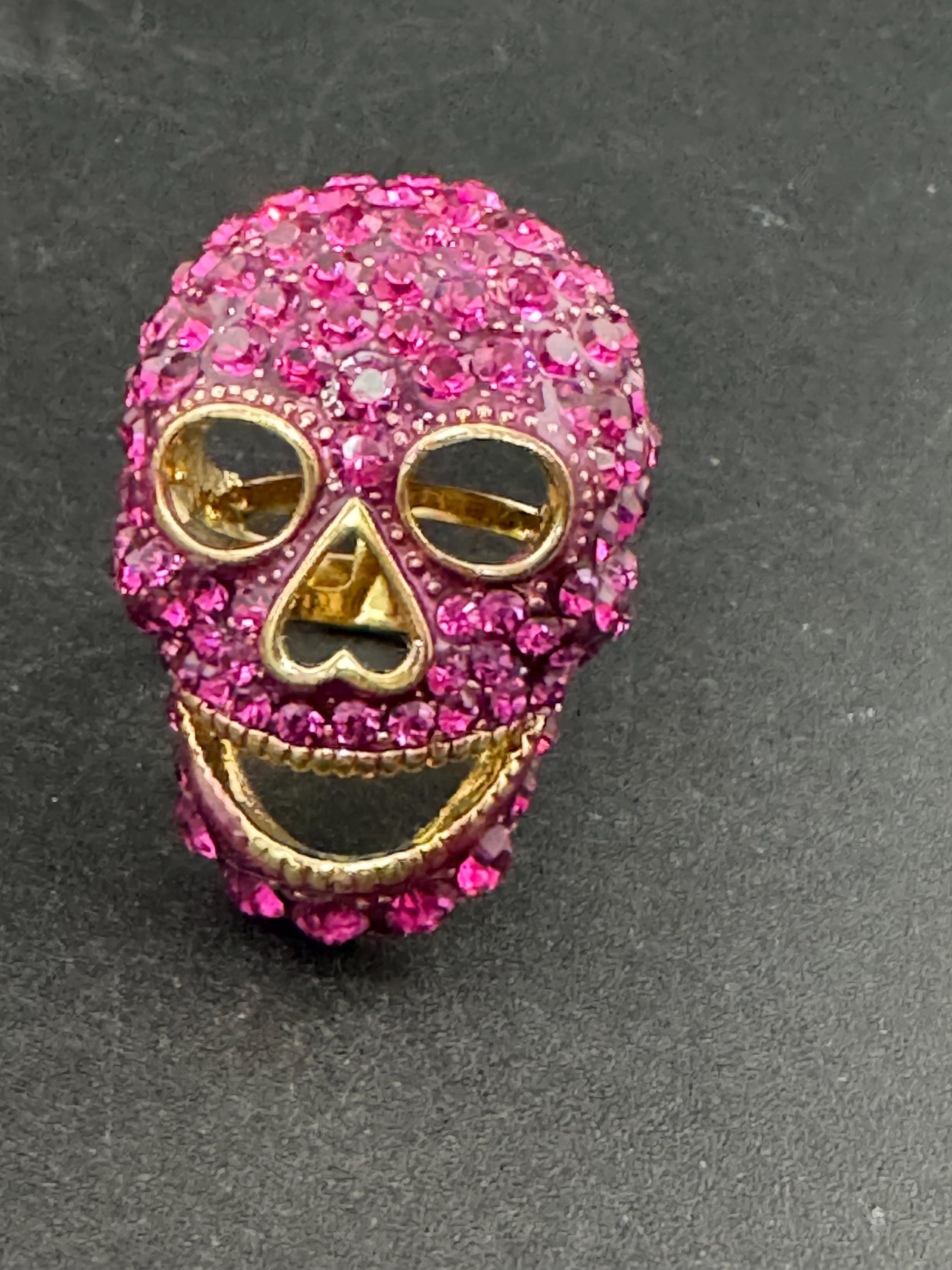 retro pink rhinestone skull ring by butler and Wilson , adjustable and signed