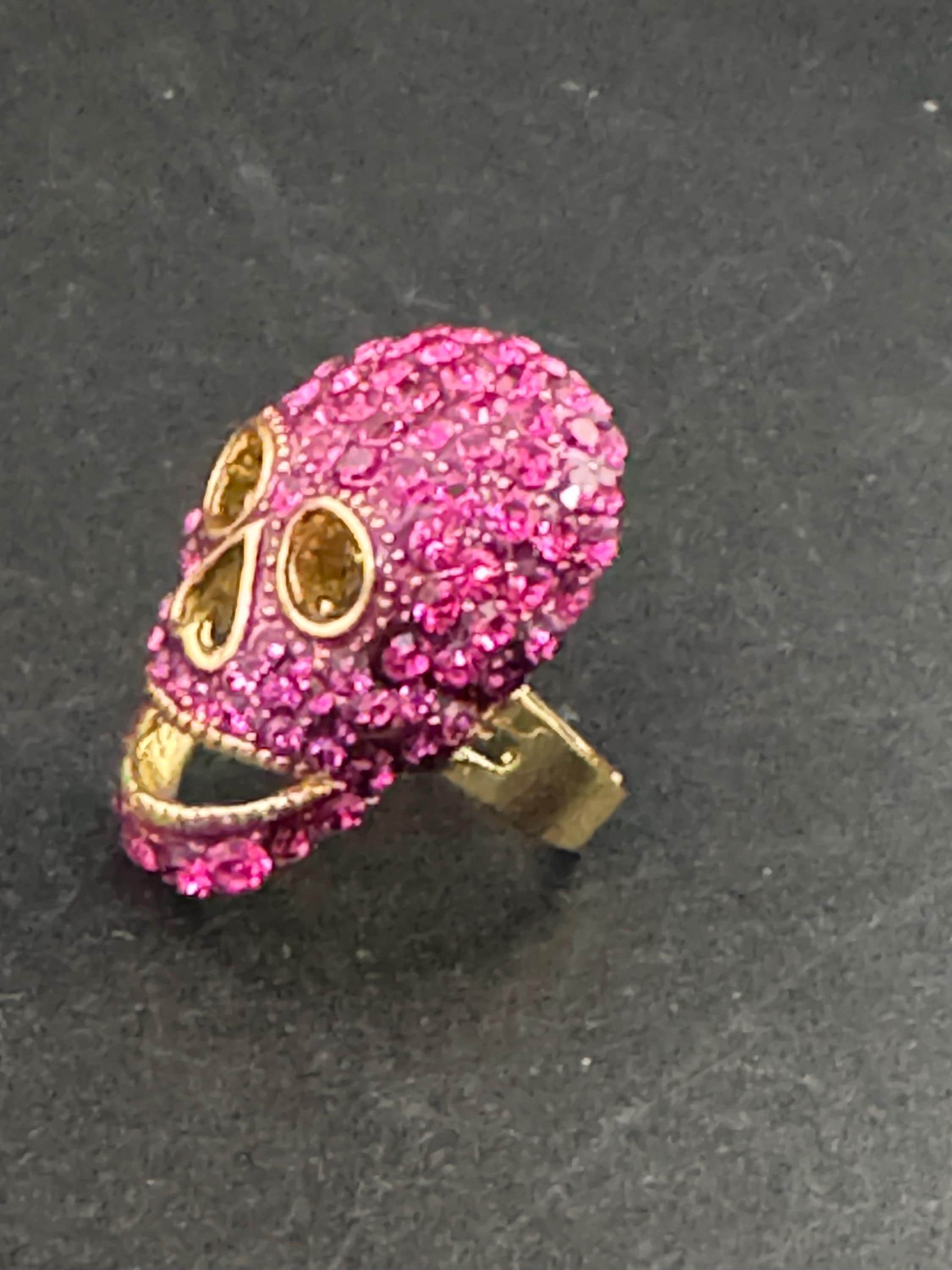 retro pink rhinestone skull ring by butler and Wilson , adjustable and signed