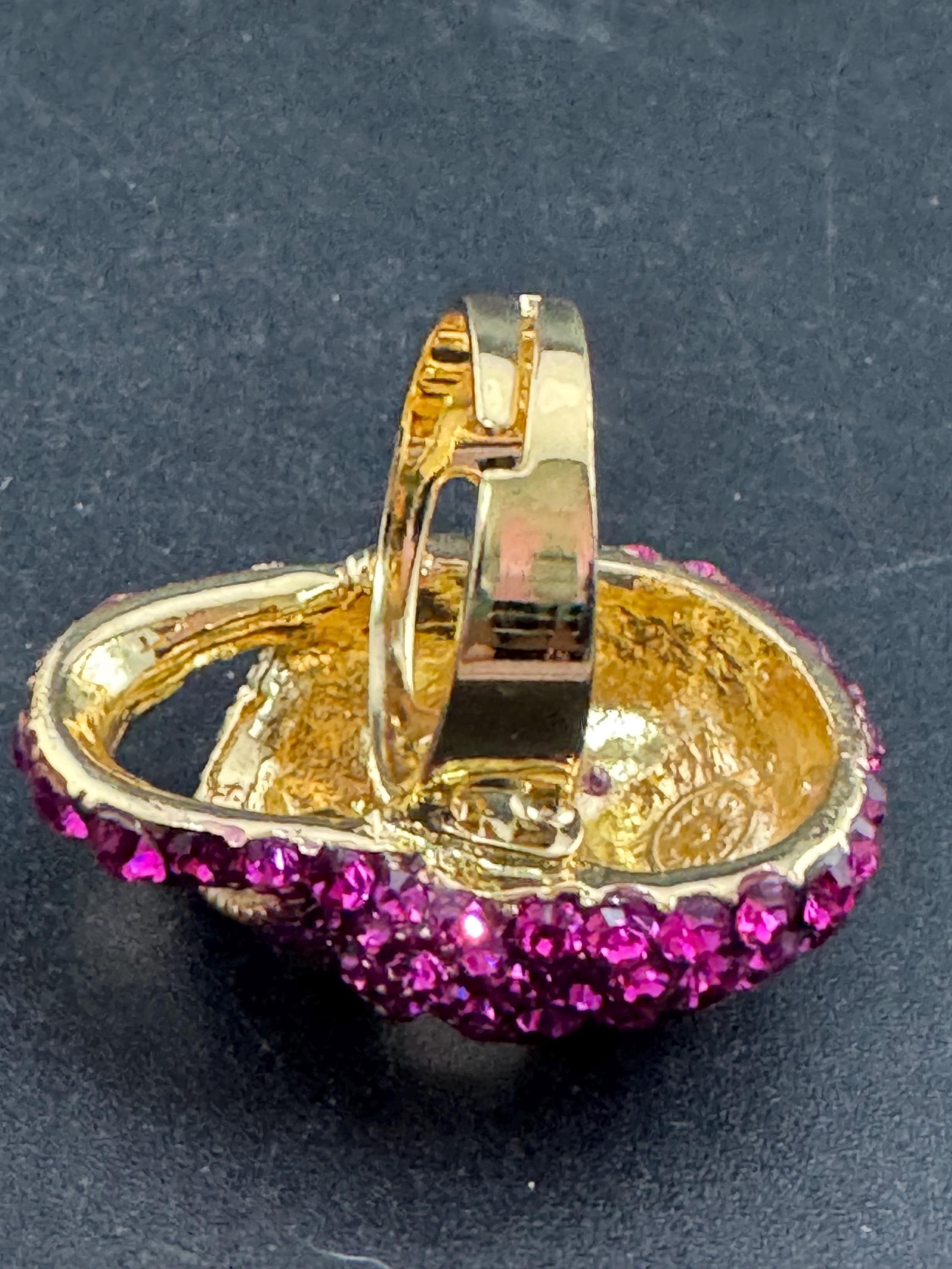 retro pink rhinestone skull ring by butler and Wilson , adjustable and signed
