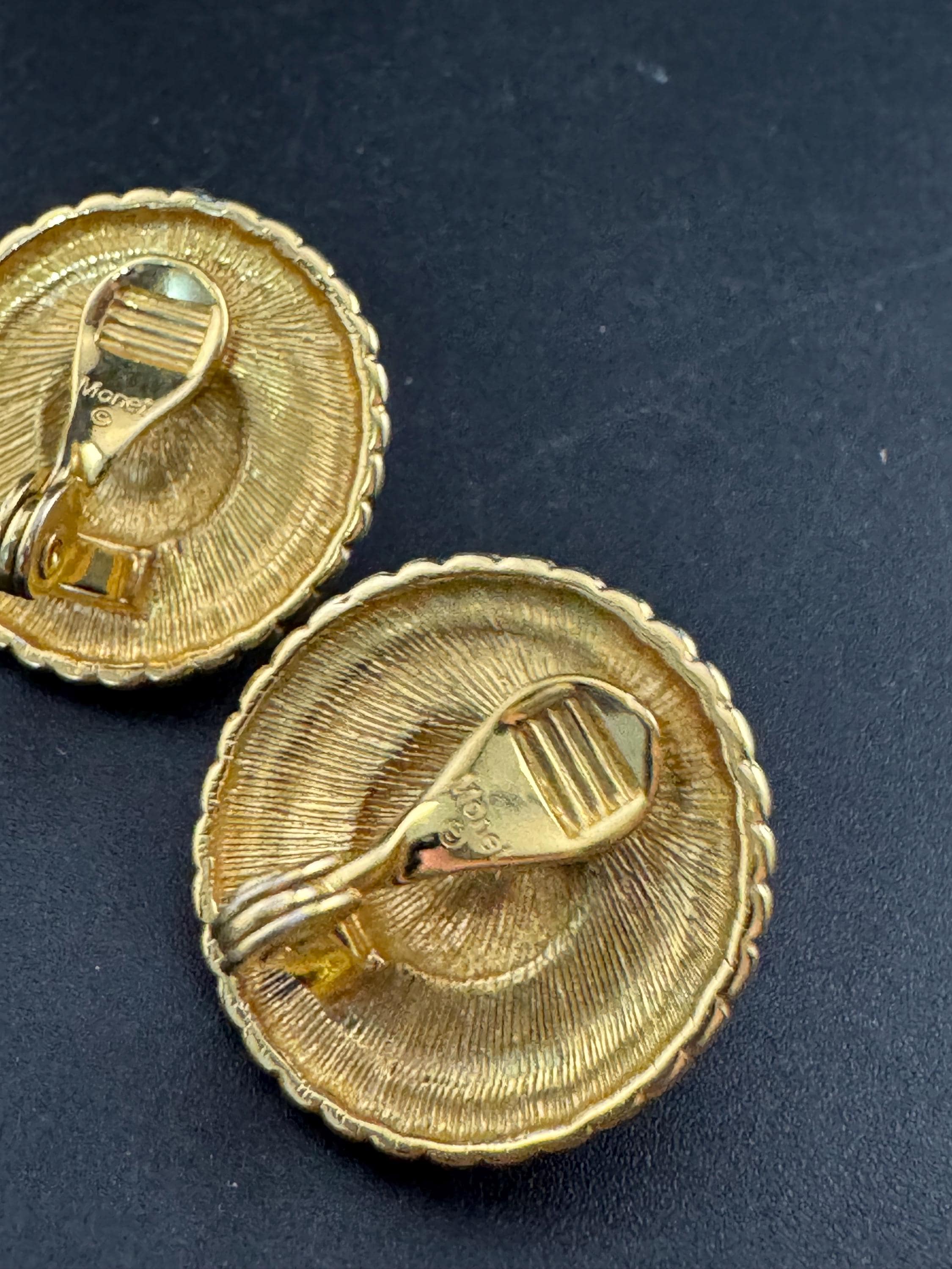 Signed monet Navy blue enamel pearl clip on earrings, gold tone stud