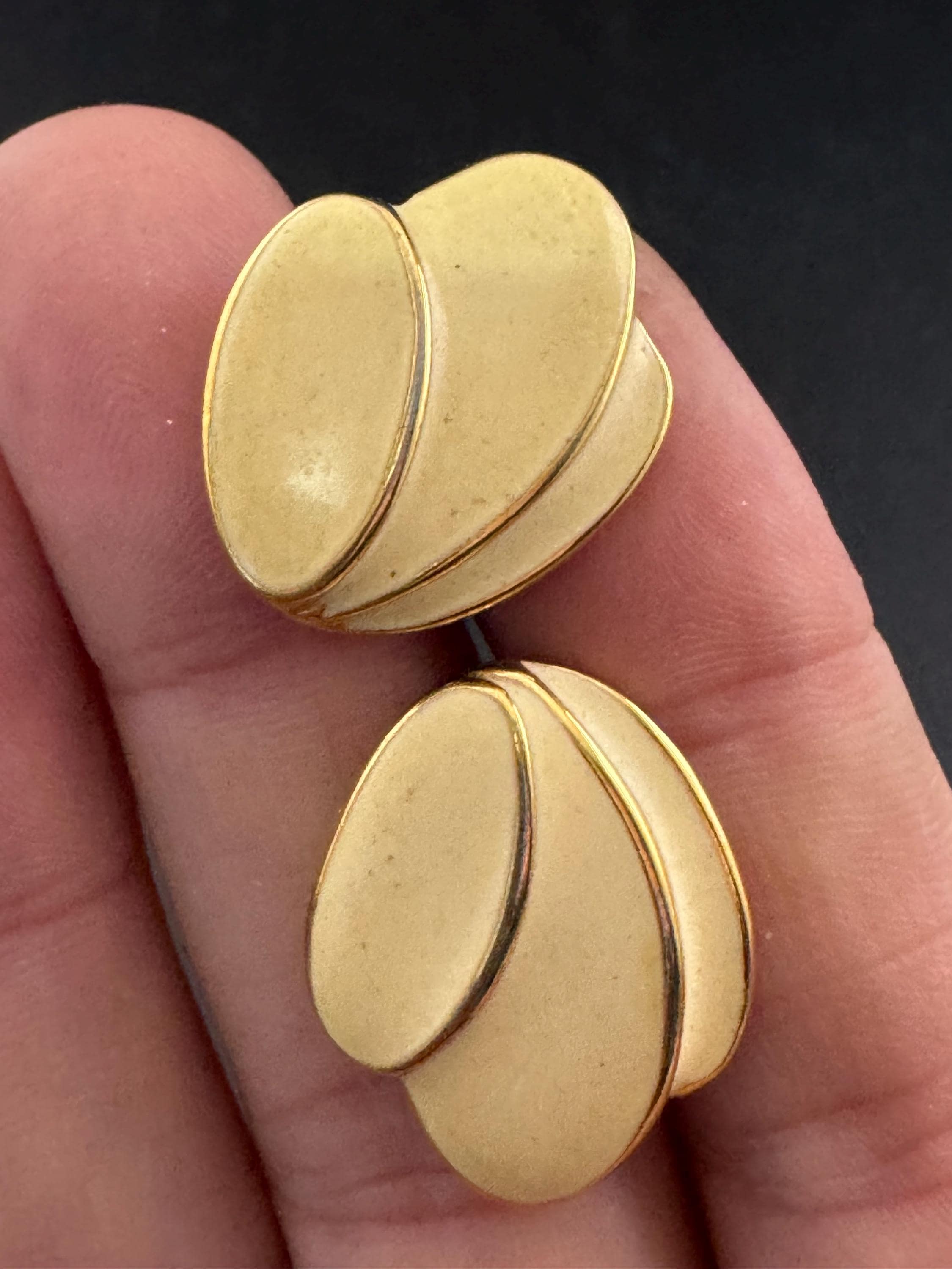 Signed Napier cream enamel pair stud earrings, gold tone pierced