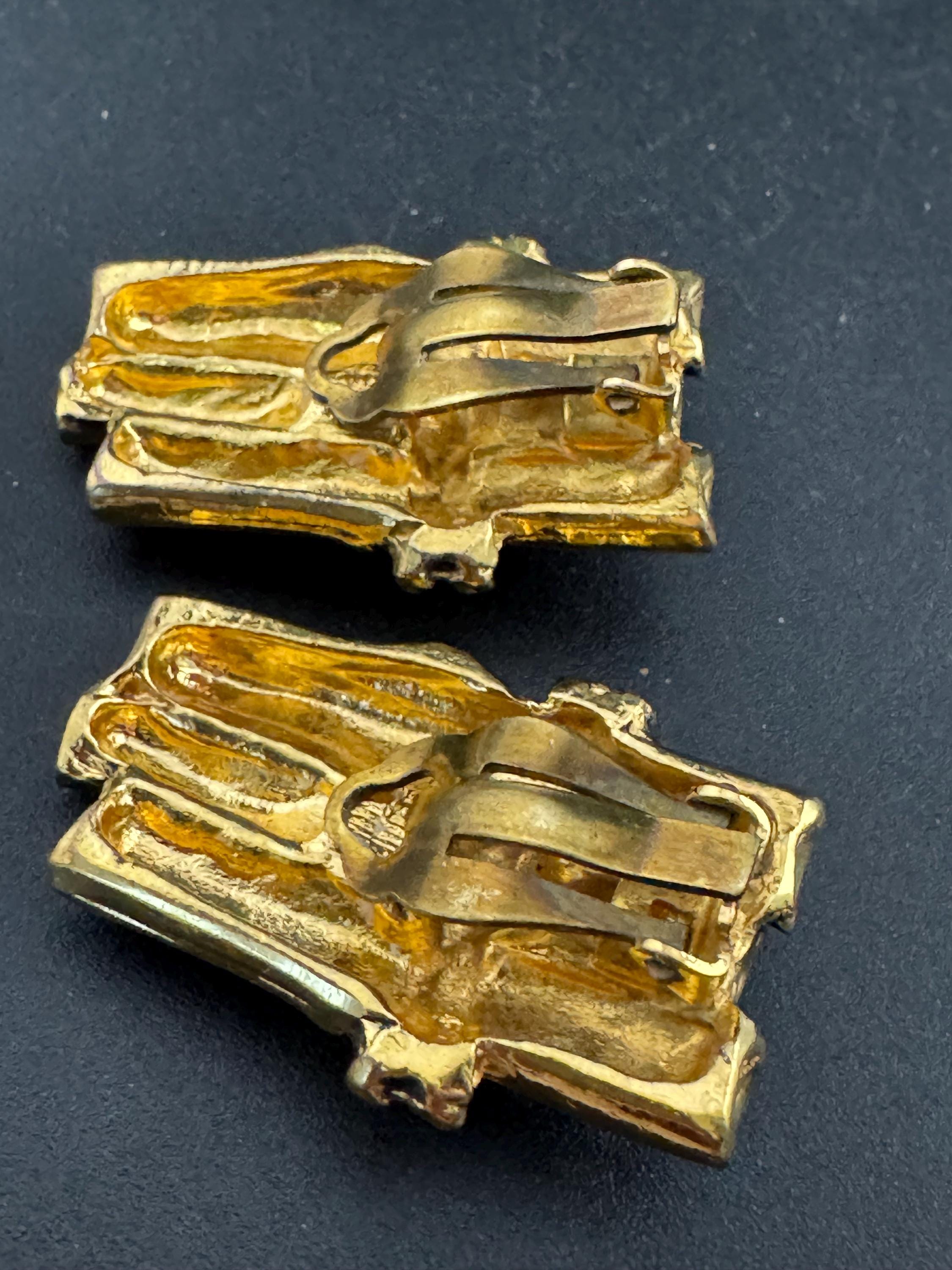 Signed Sidney carron rope twist clip on earrings, designer gold tone