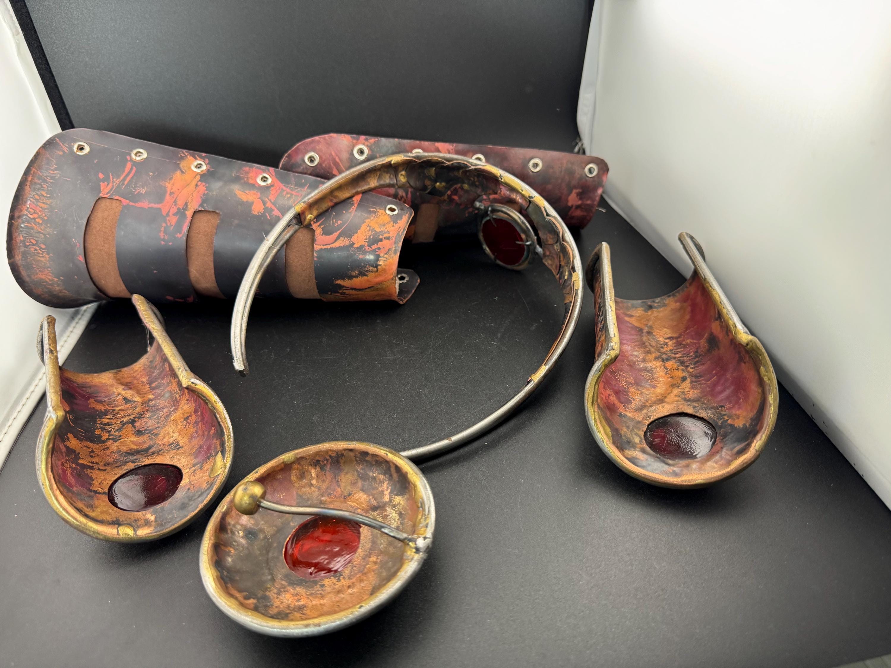 Artisan Amazonian warrior princess fancy dress outfit. copper tiara brooch shin and wrist cuffs